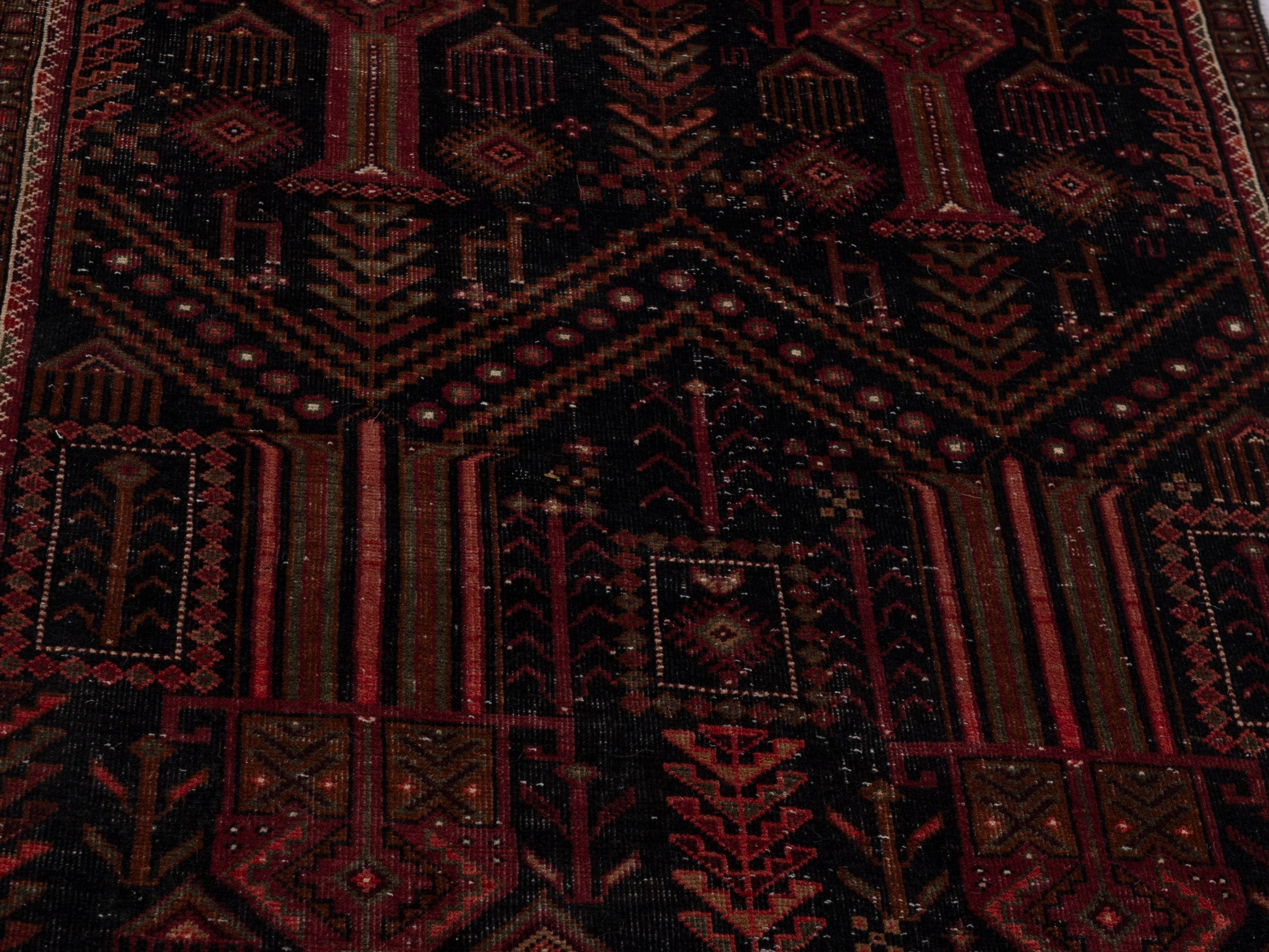 Persian Baluch runner rug in burgundy and deep red, view 7 of 21