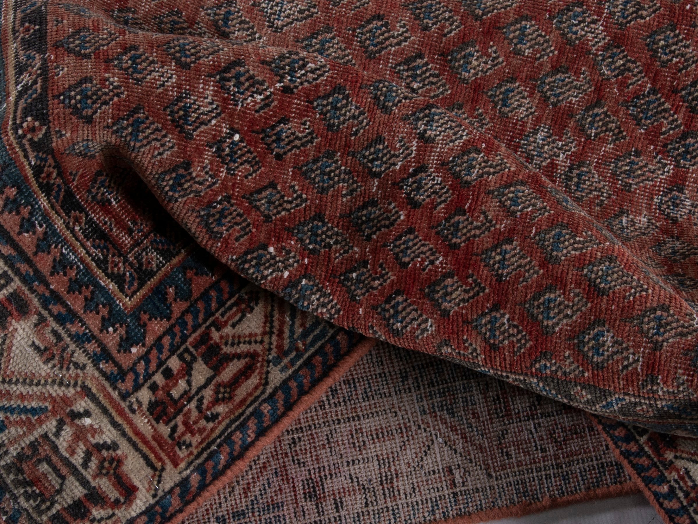 Persian Arak runner rug in burgundy and faded red, view 16 of 17