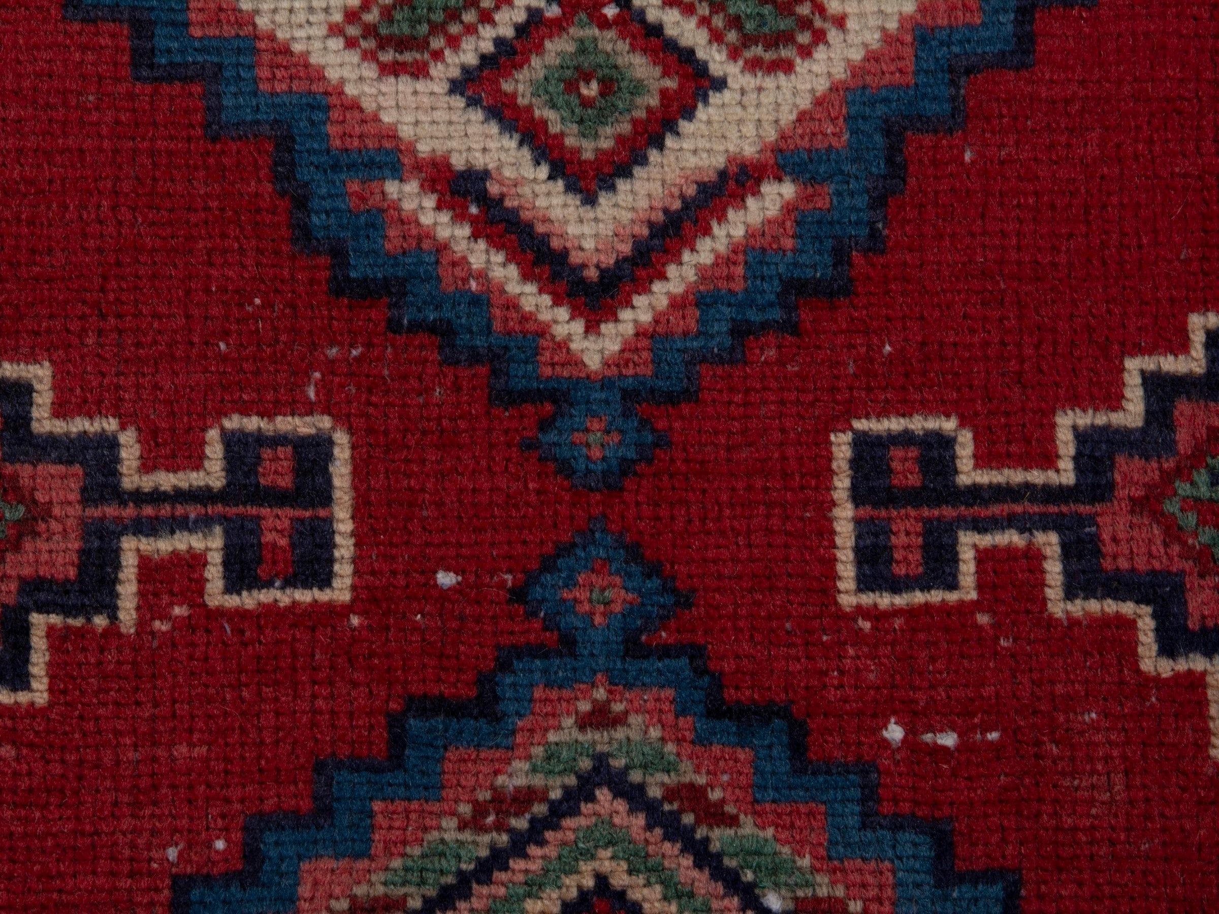 Persian Songhor runner rug in deep red and cream, view 12 of 18