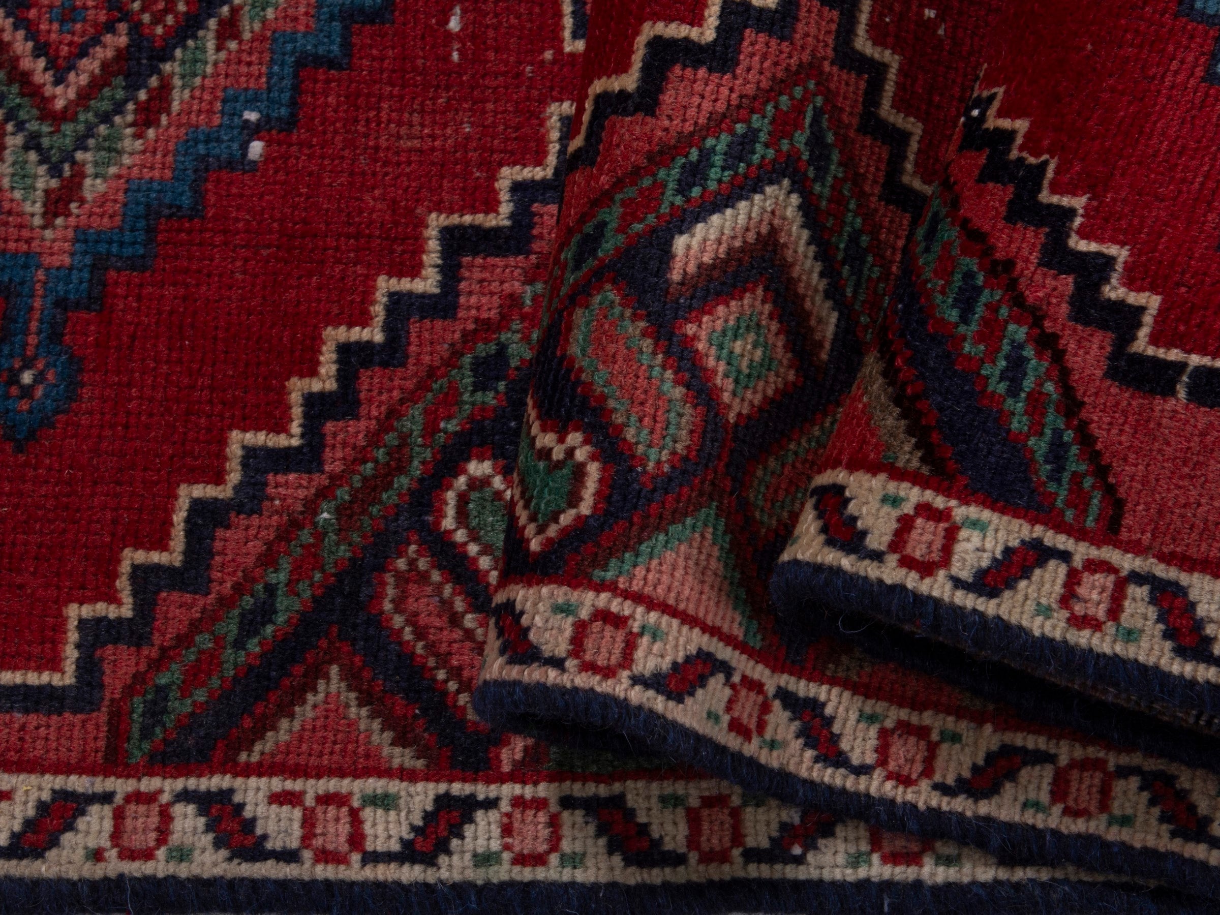 Persian Songhor runner rug in deep red and cream, view 14 of 18