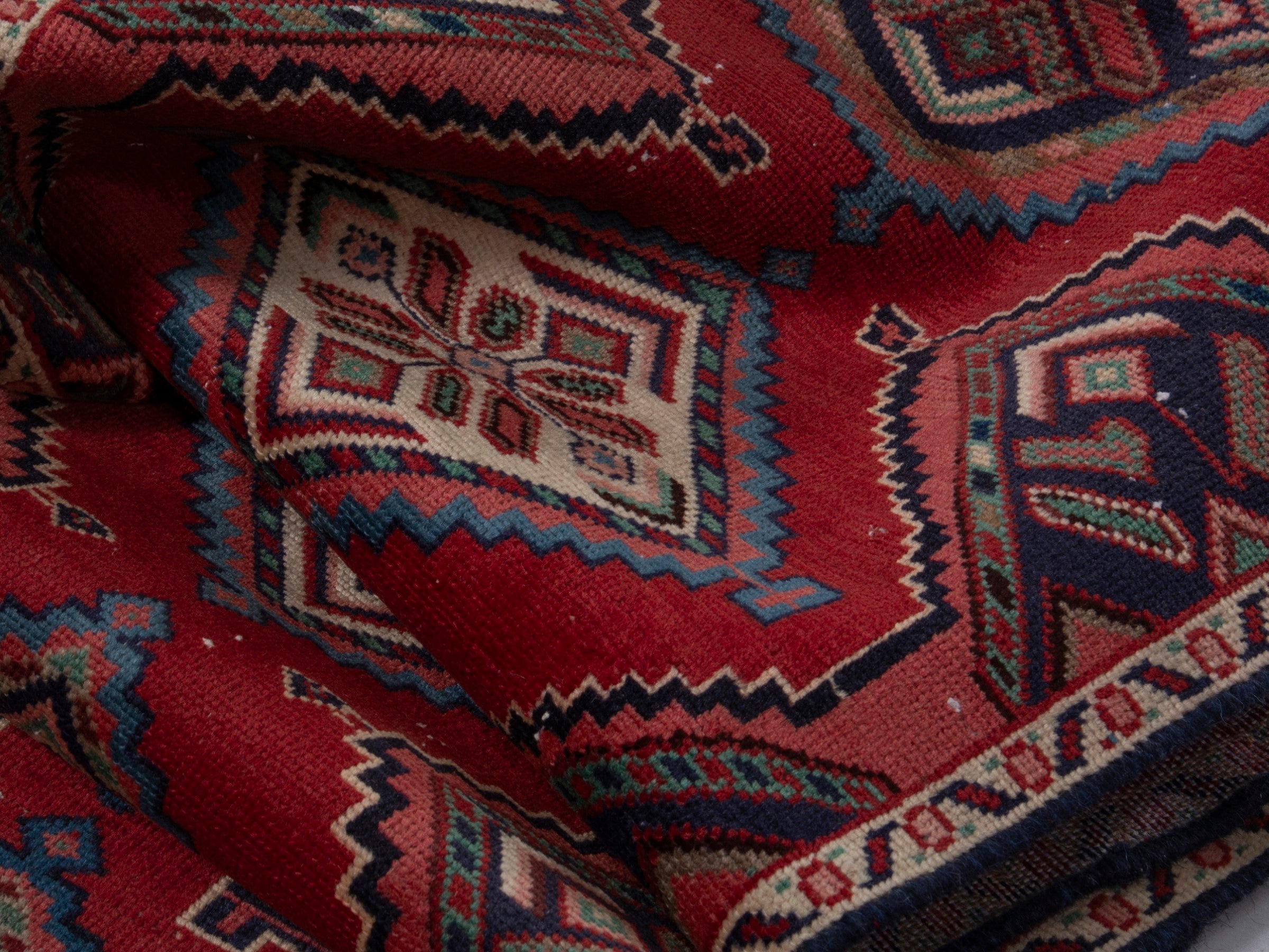 Persian Songhor runner rug in deep red and cream, view 16 of 18