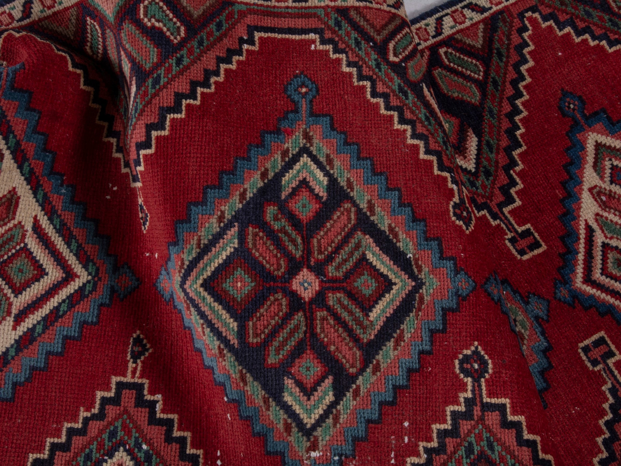 Persian Songhor runner rug in deep red and cream, view 17 of 18
