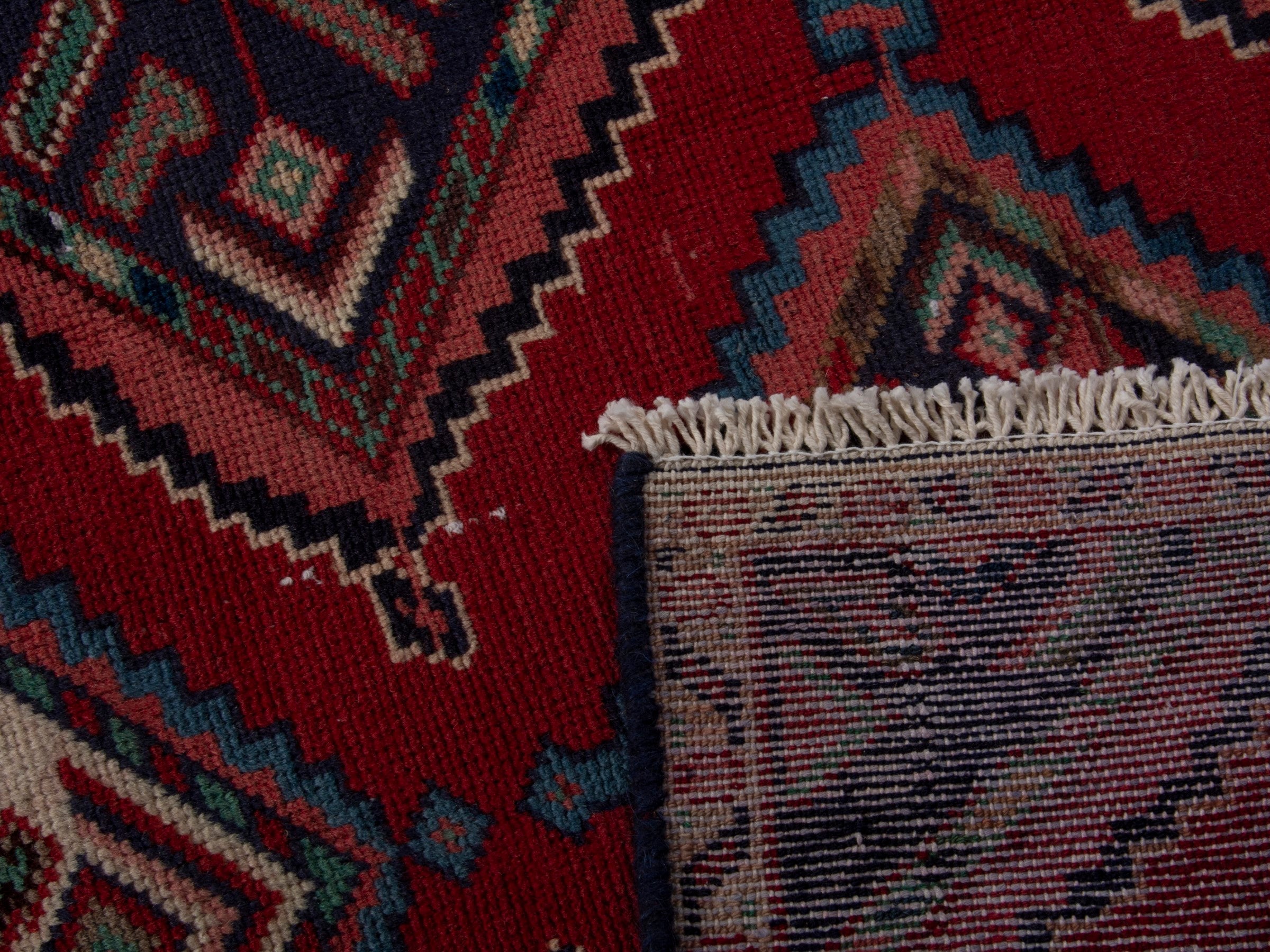 Persian Songhor runner rug in deep red and cream, view 18 of 18