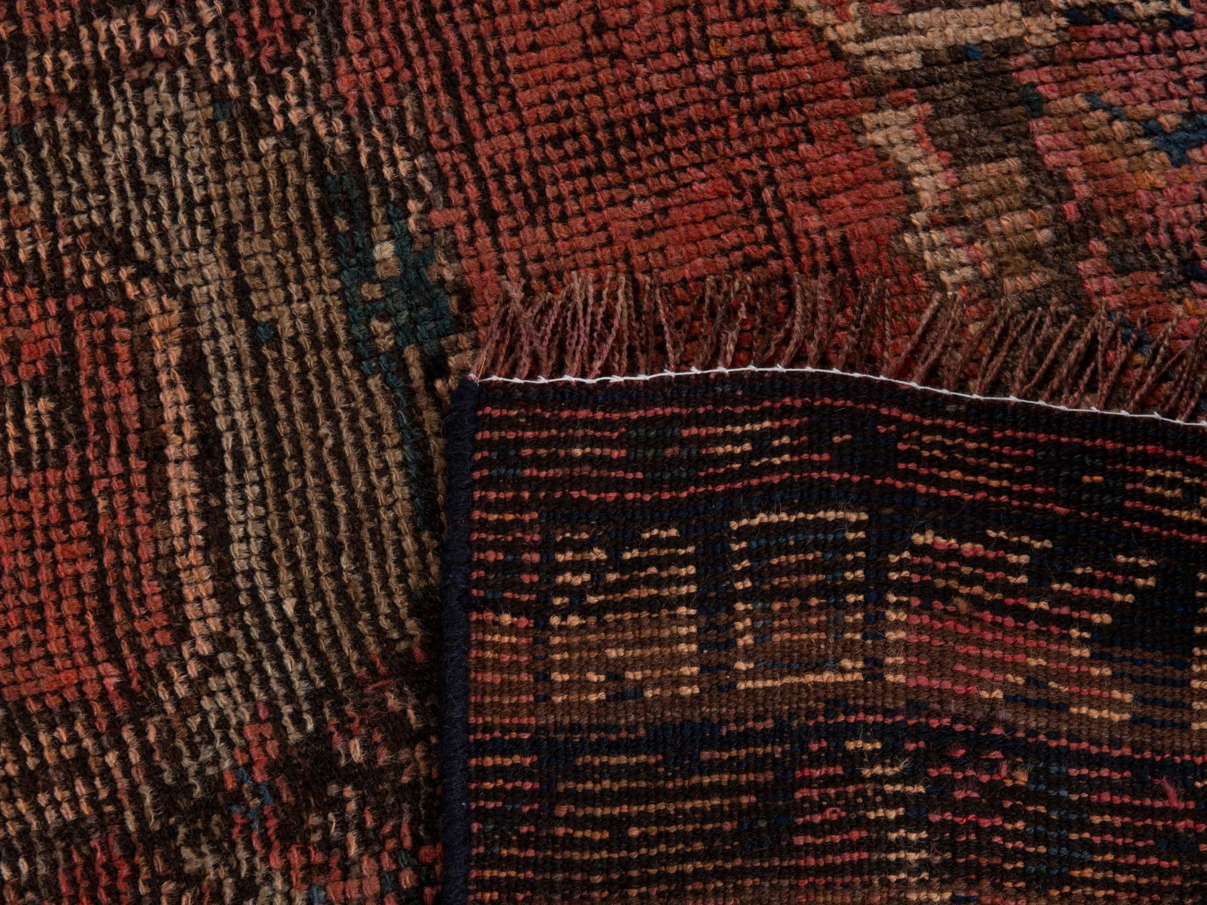 Persian Shiraz runner rug in rust and faded red, view 19 of 19
