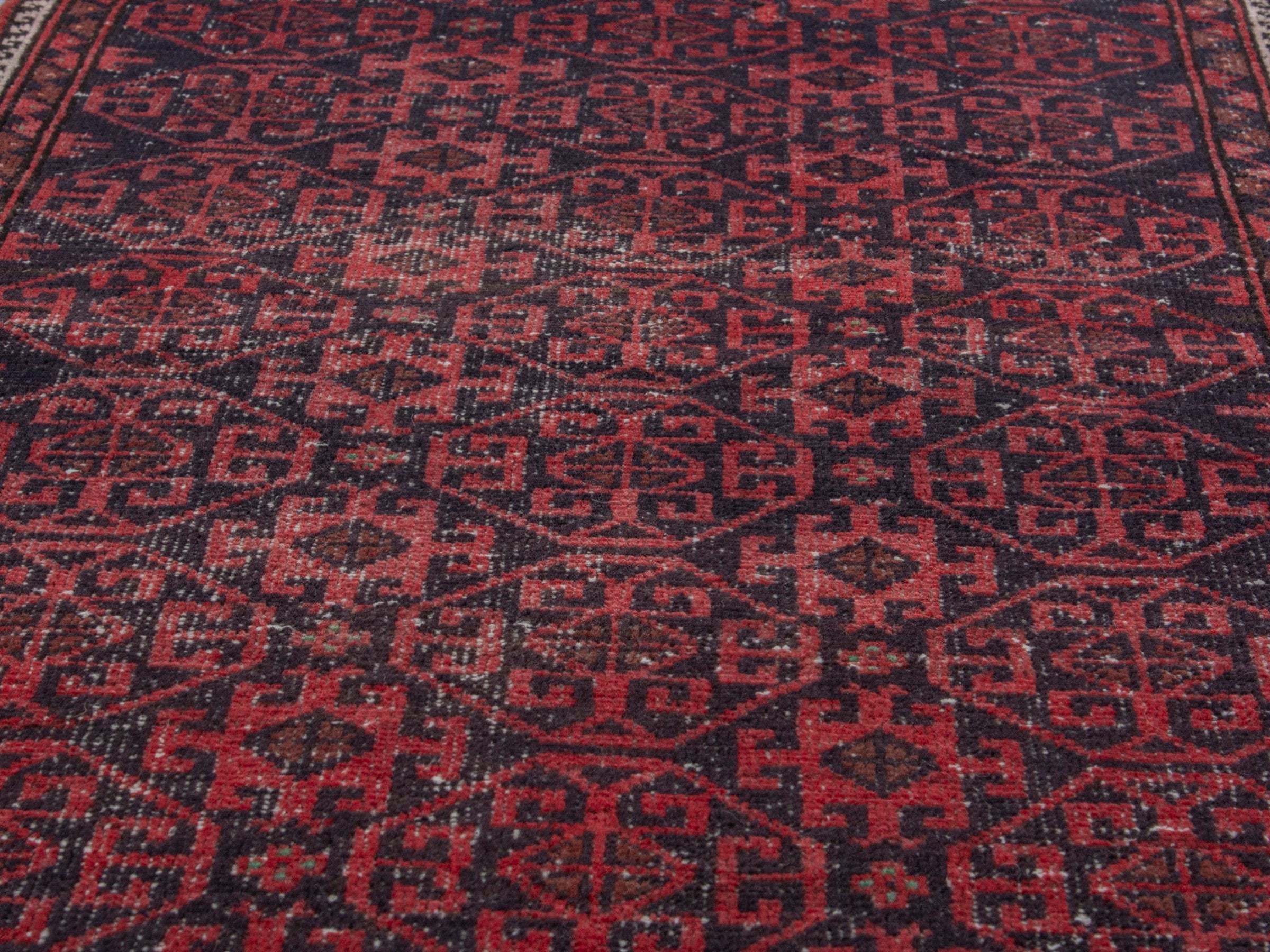 Persian Baluch runner rug in burgundy and deep red, view 11 of 18