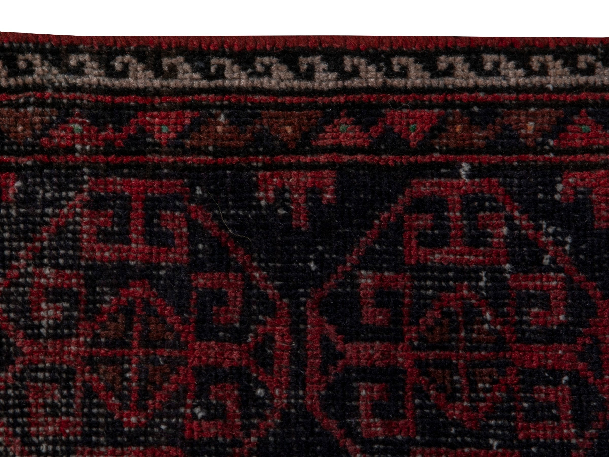 Persian Baluch runner rug in burgundy and deep red, view 9 of 18