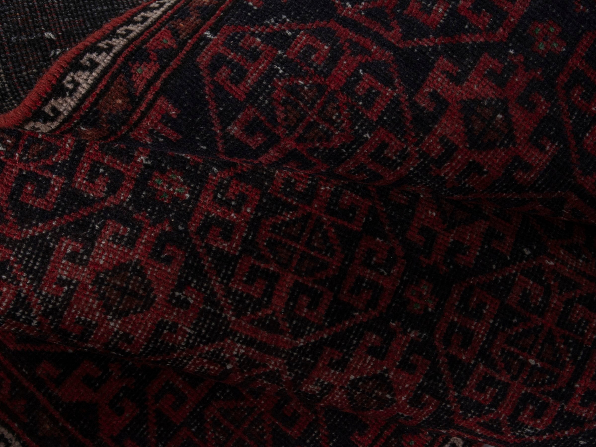 Persian Baluch runner rug in burgundy and deep red, view 17 of 18