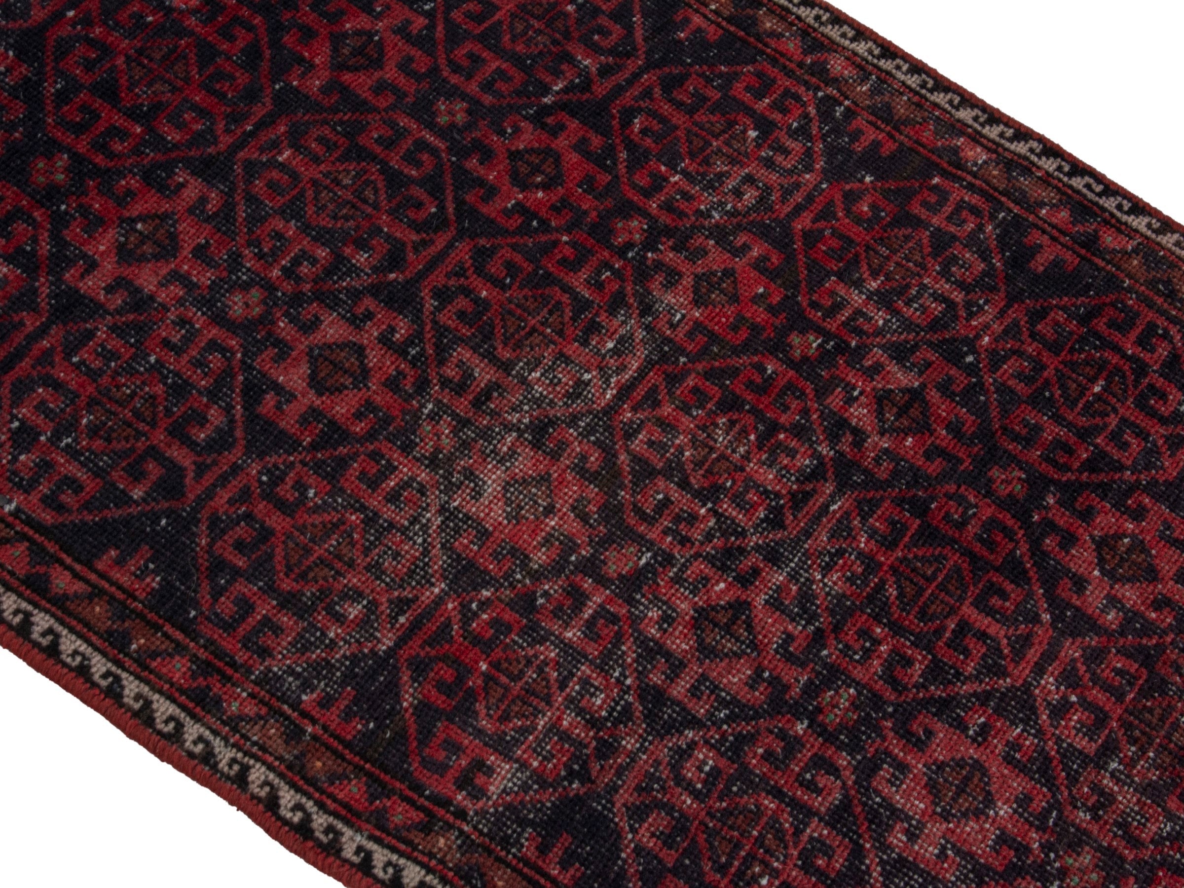 Persian Baluch runner rug in burgundy and deep red, view 4 of 18