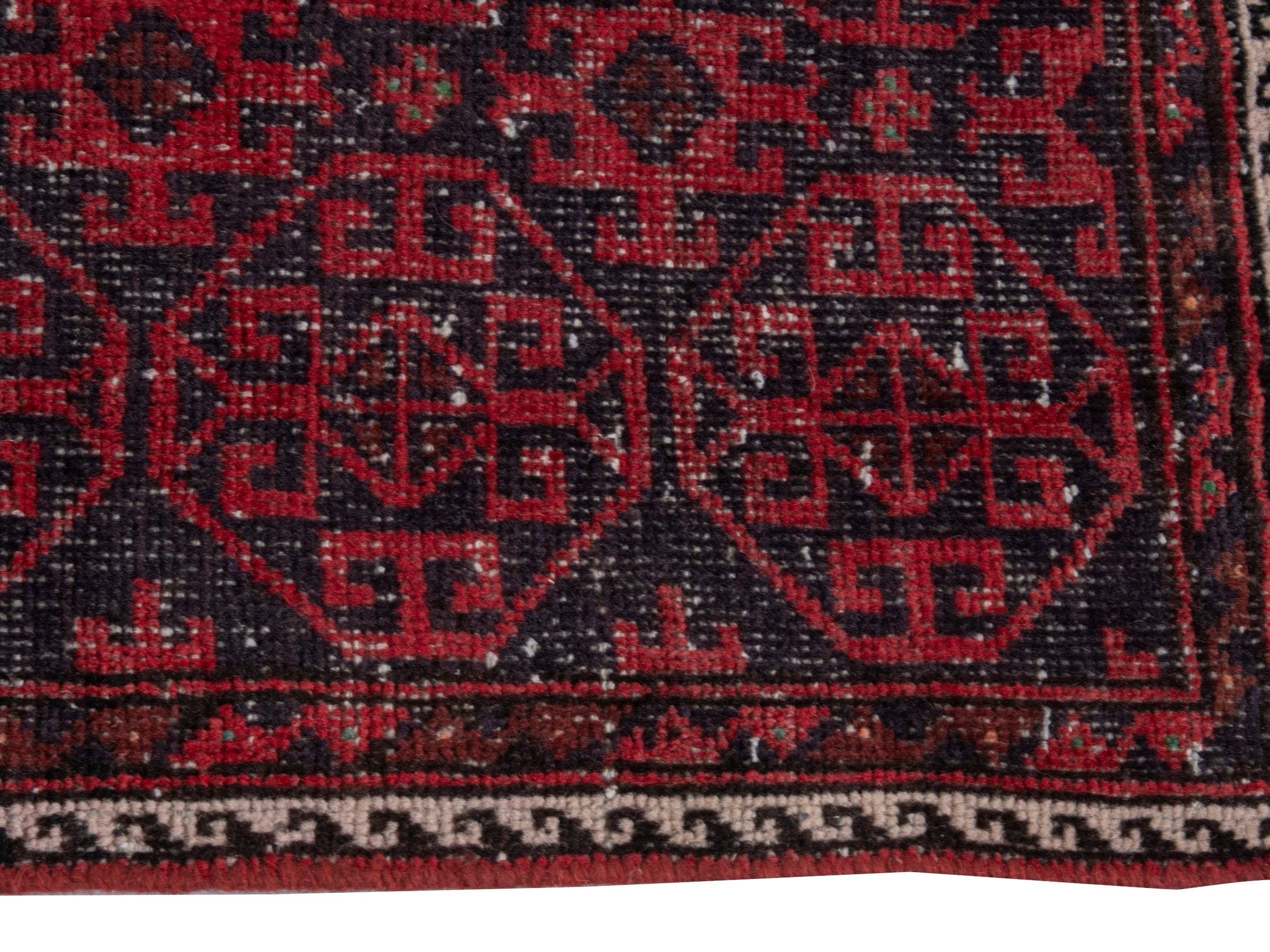 Persian Baluch runner rug in burgundy and deep red, view 5 of 18