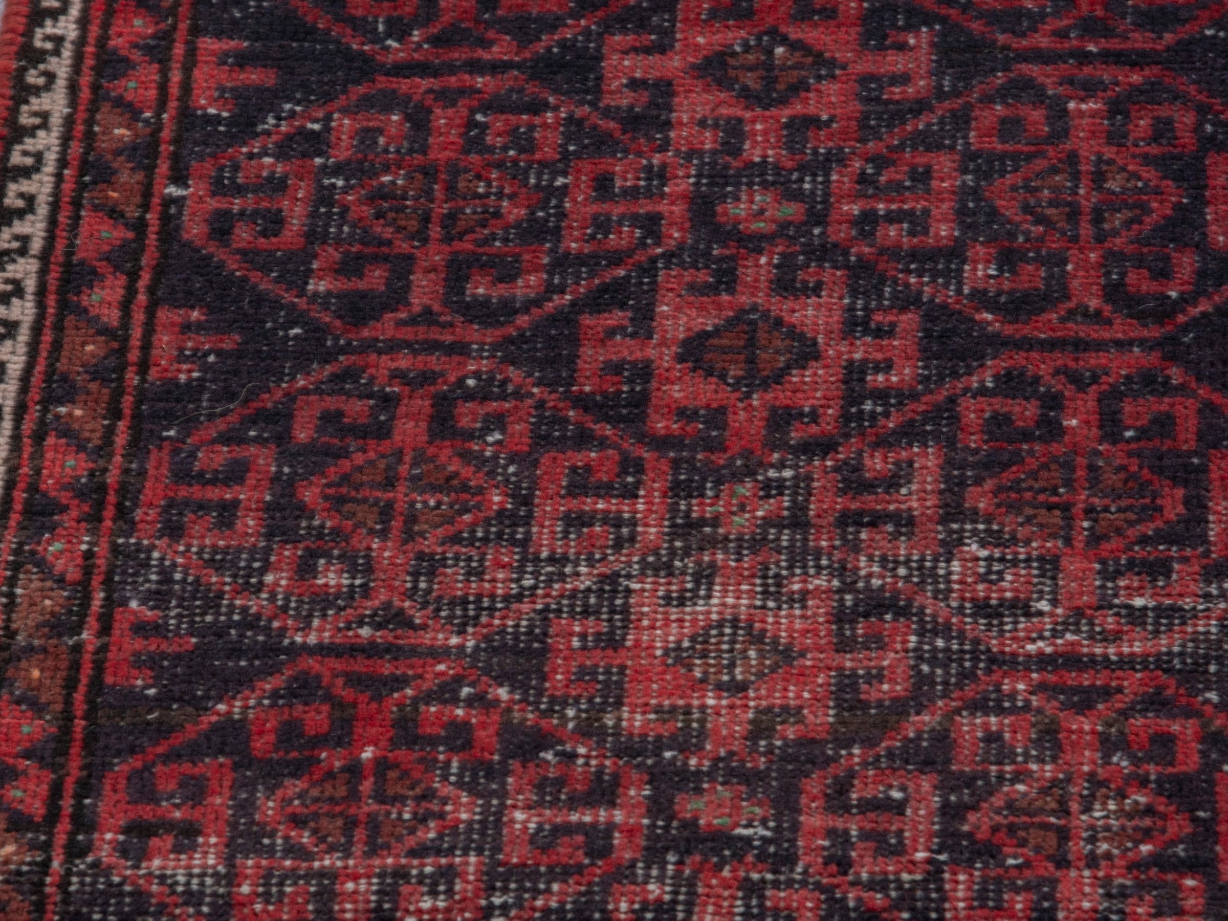 Persian Baluch runner rug in burgundy and deep red, view 7 of 18