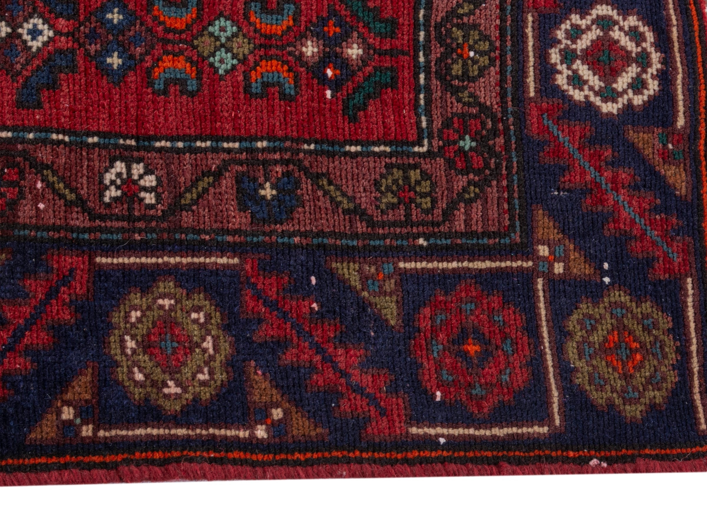 Persian Songhor area rug in cream and burgundy, view 5 of 18