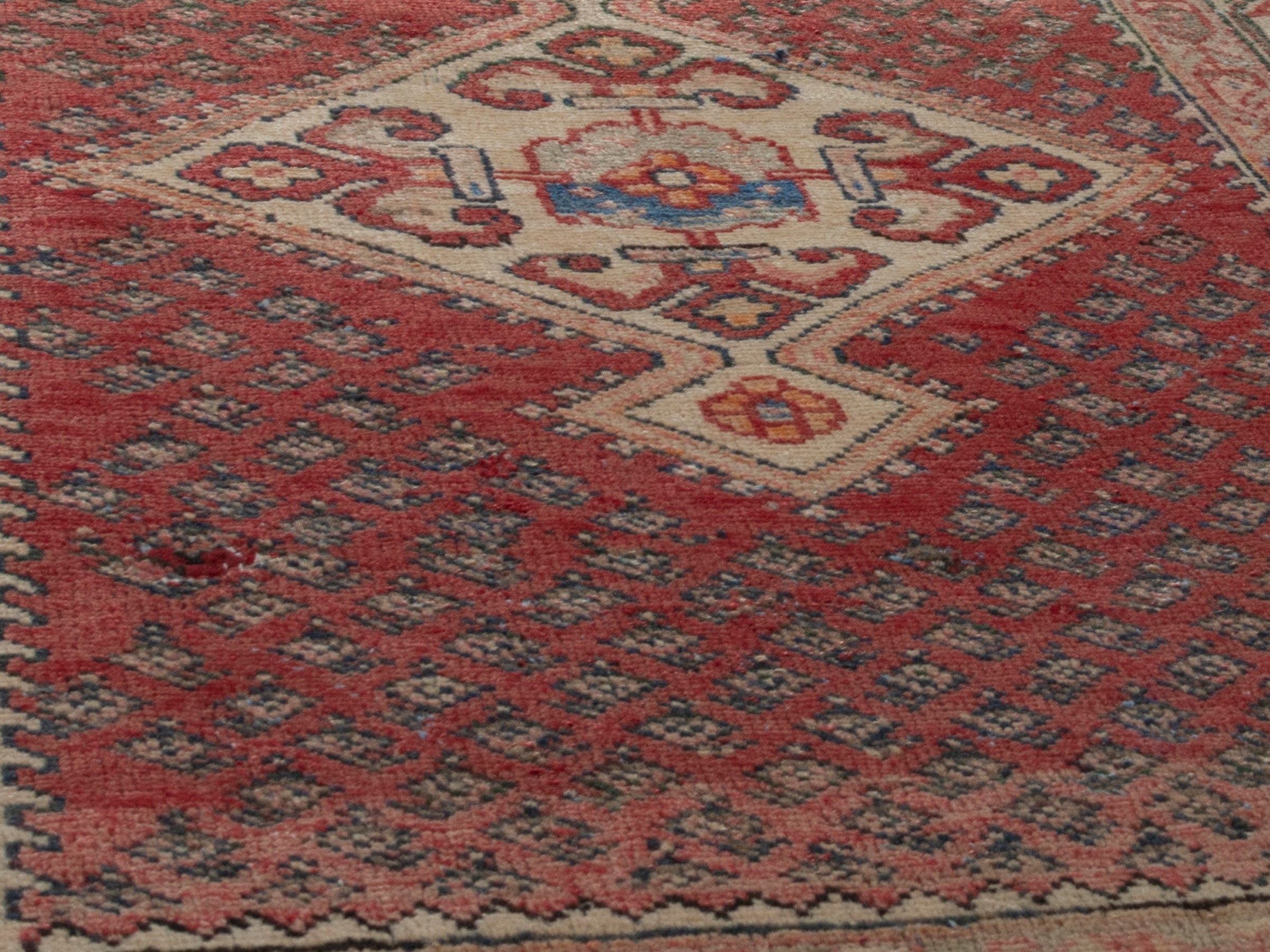 Persian Arak accent rug in deep red and tan, view 10 of 17