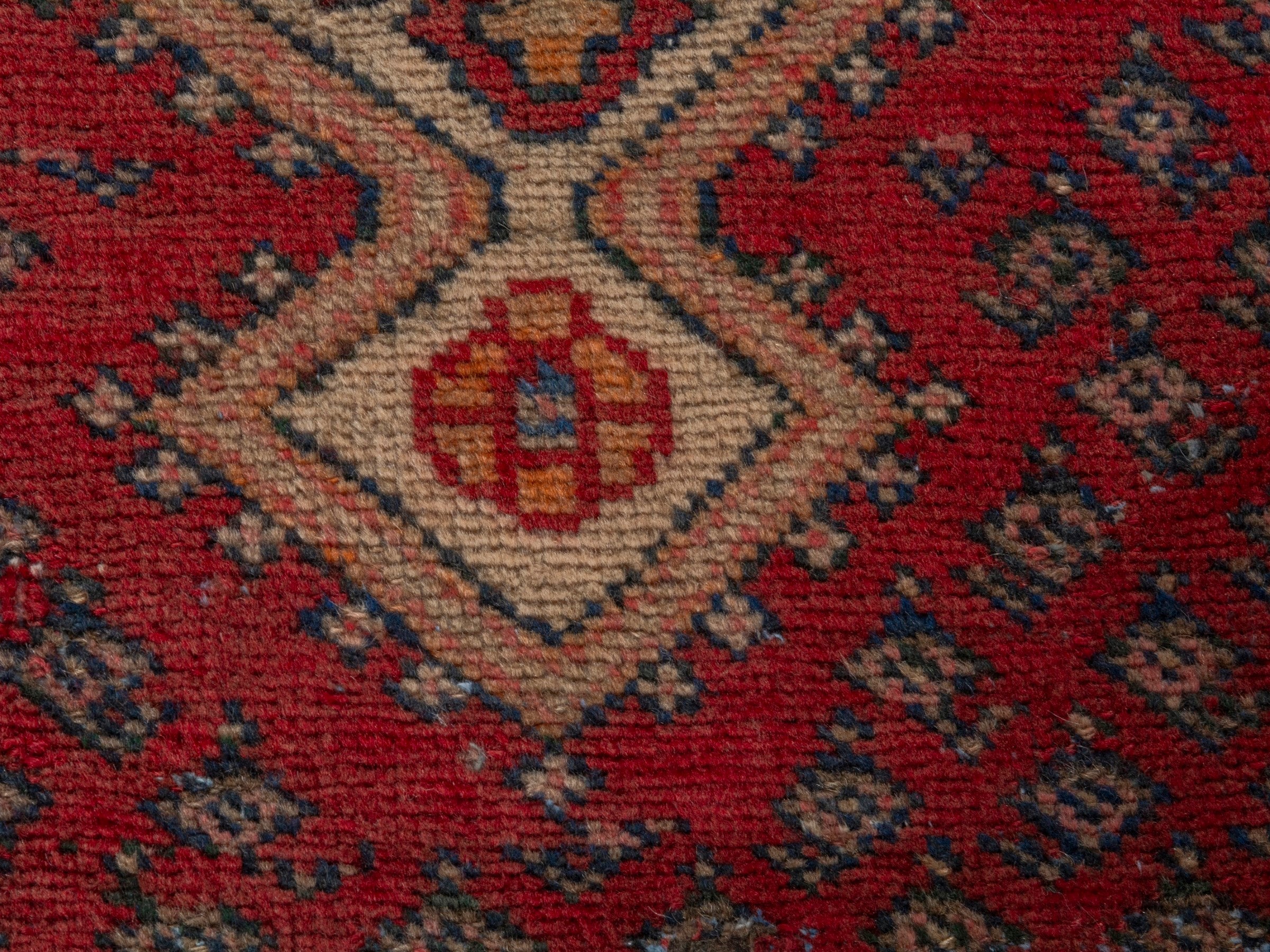 Persian Arak accent rug in deep red and tan, view 12 of 17