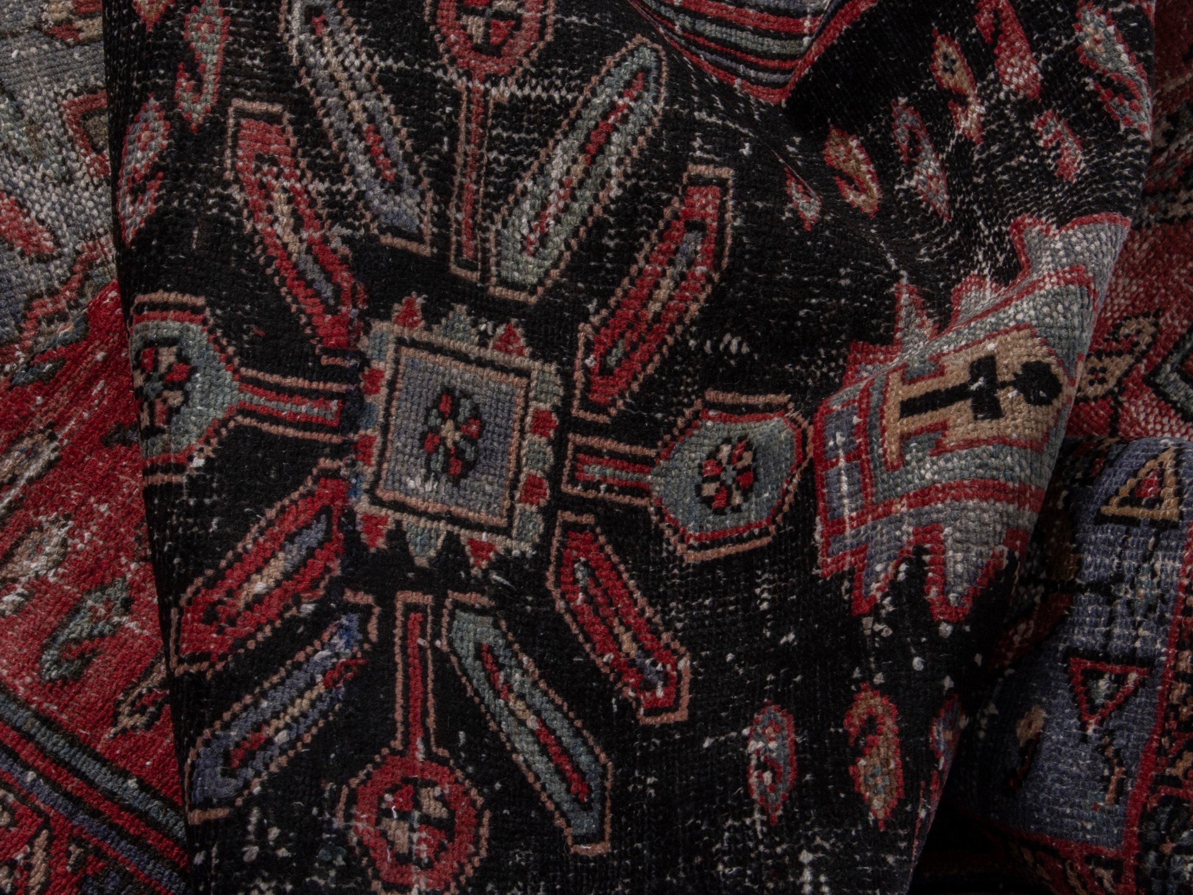 Persian Zanjan area rug in faded red and black cherry, view 17 of 20
