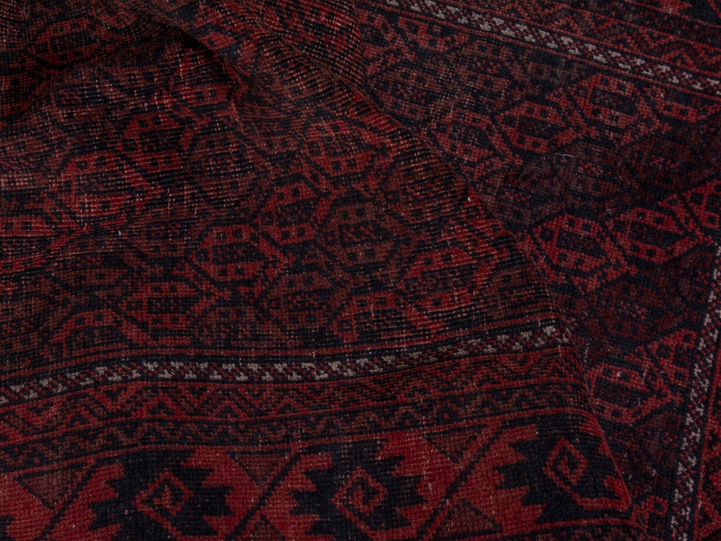 Persian Baluch accent rug in dark brown and faded red, view 16 of 20