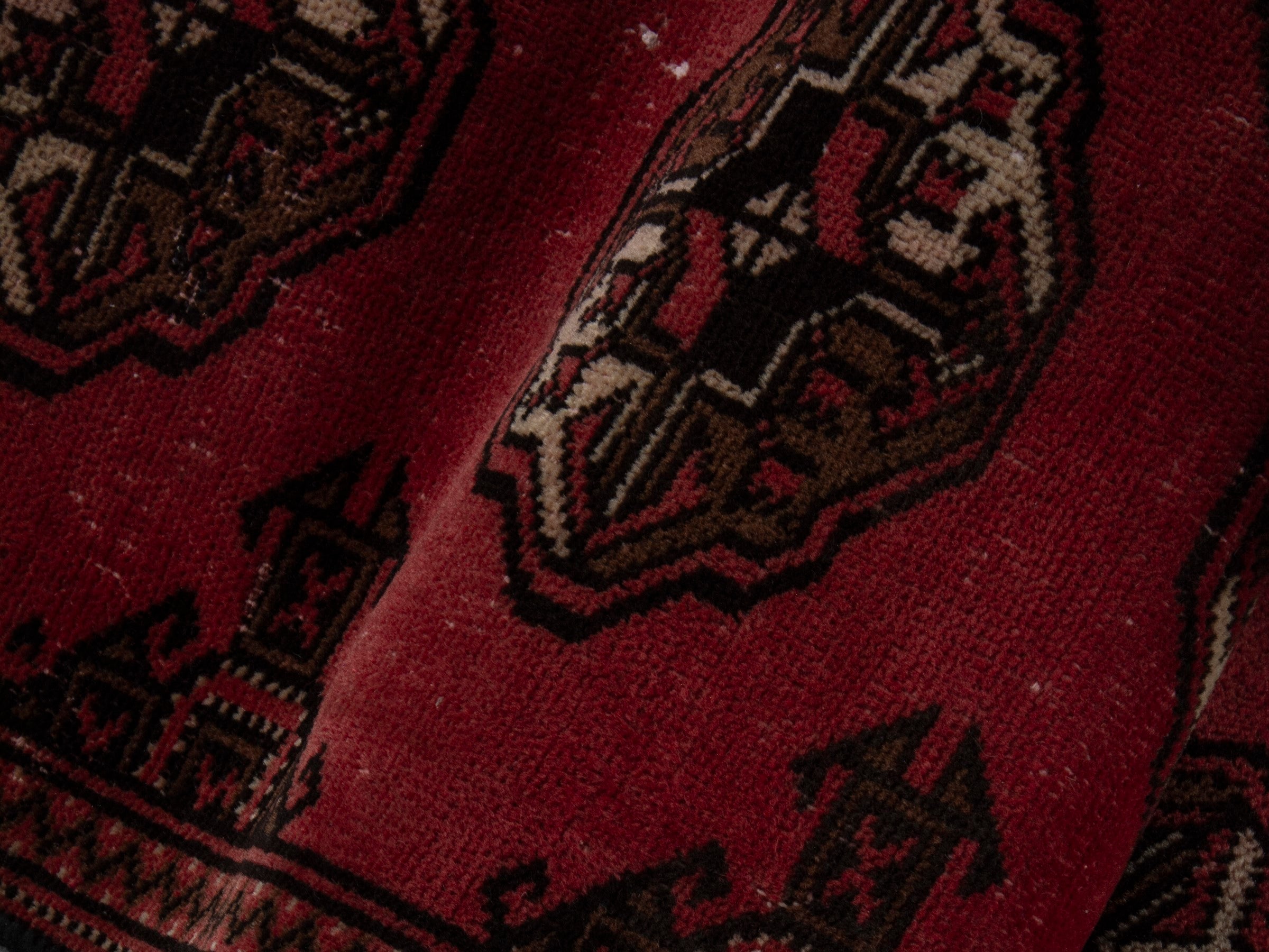 Persian Torkaman accent rug in deep red and dark brown, view 16 of 17