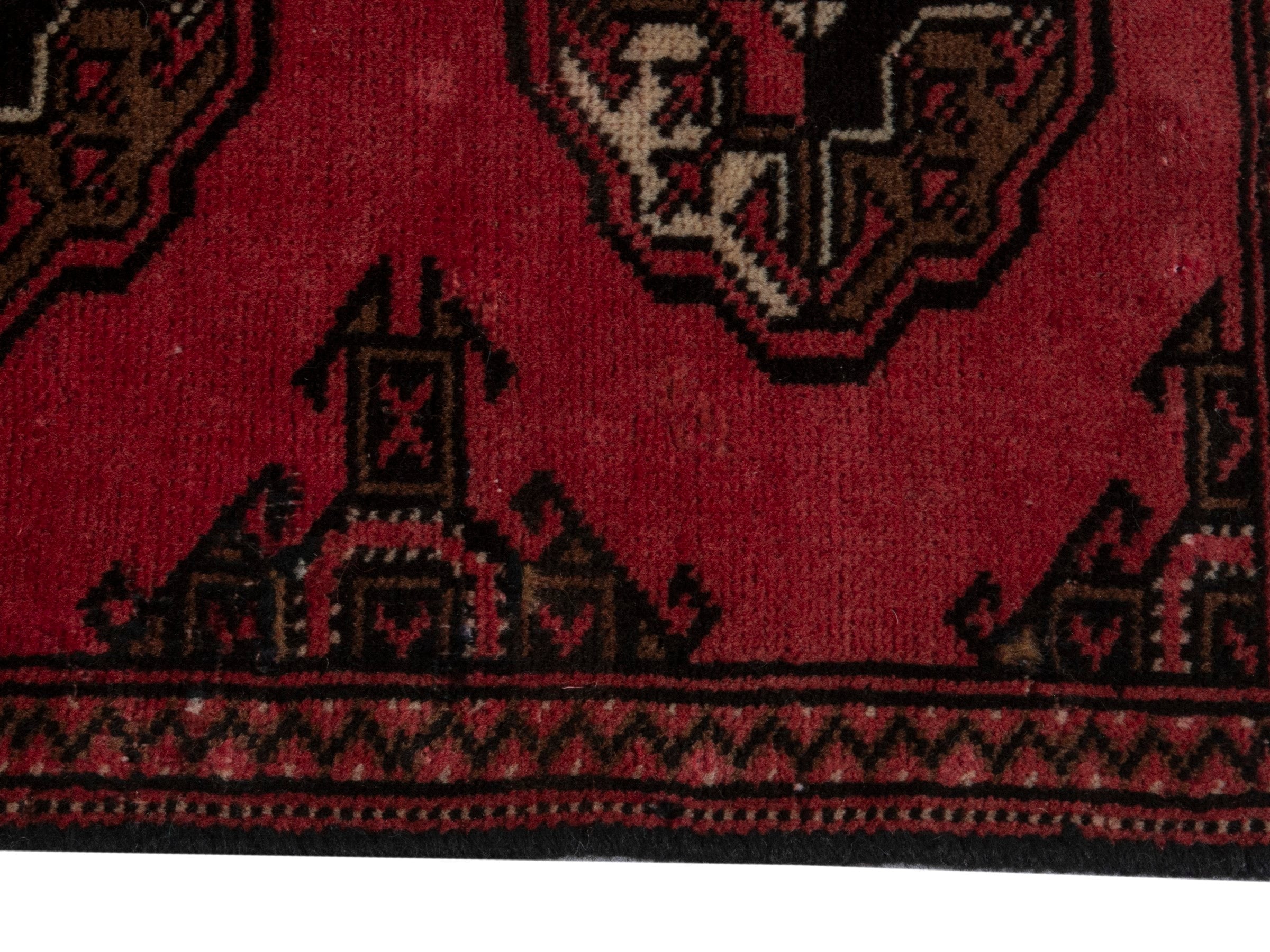 Persian Torkaman accent rug in deep red and dark brown, view 4 of 17
