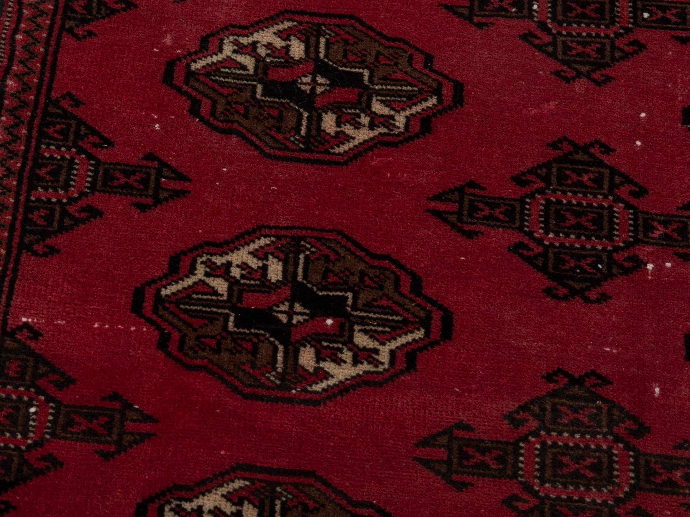 Persian Torkaman accent rug in deep red and dark brown, view 6 of 17