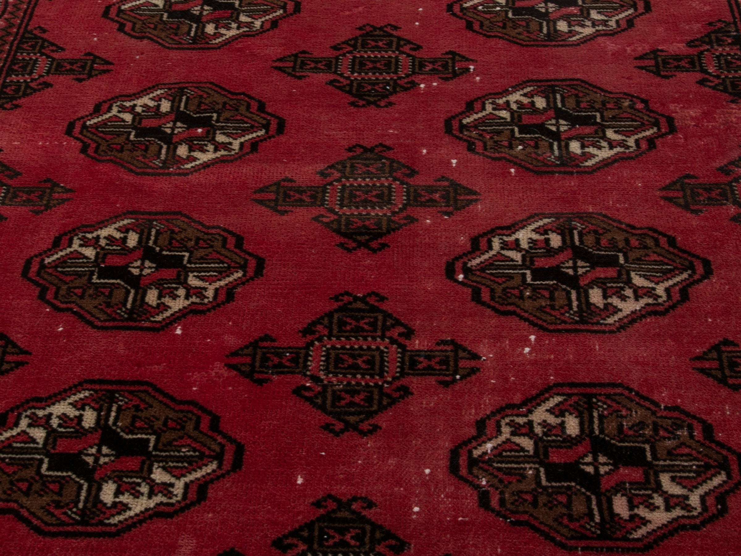 Persian Torkaman accent rug in deep red and dark brown, view 8 of 17