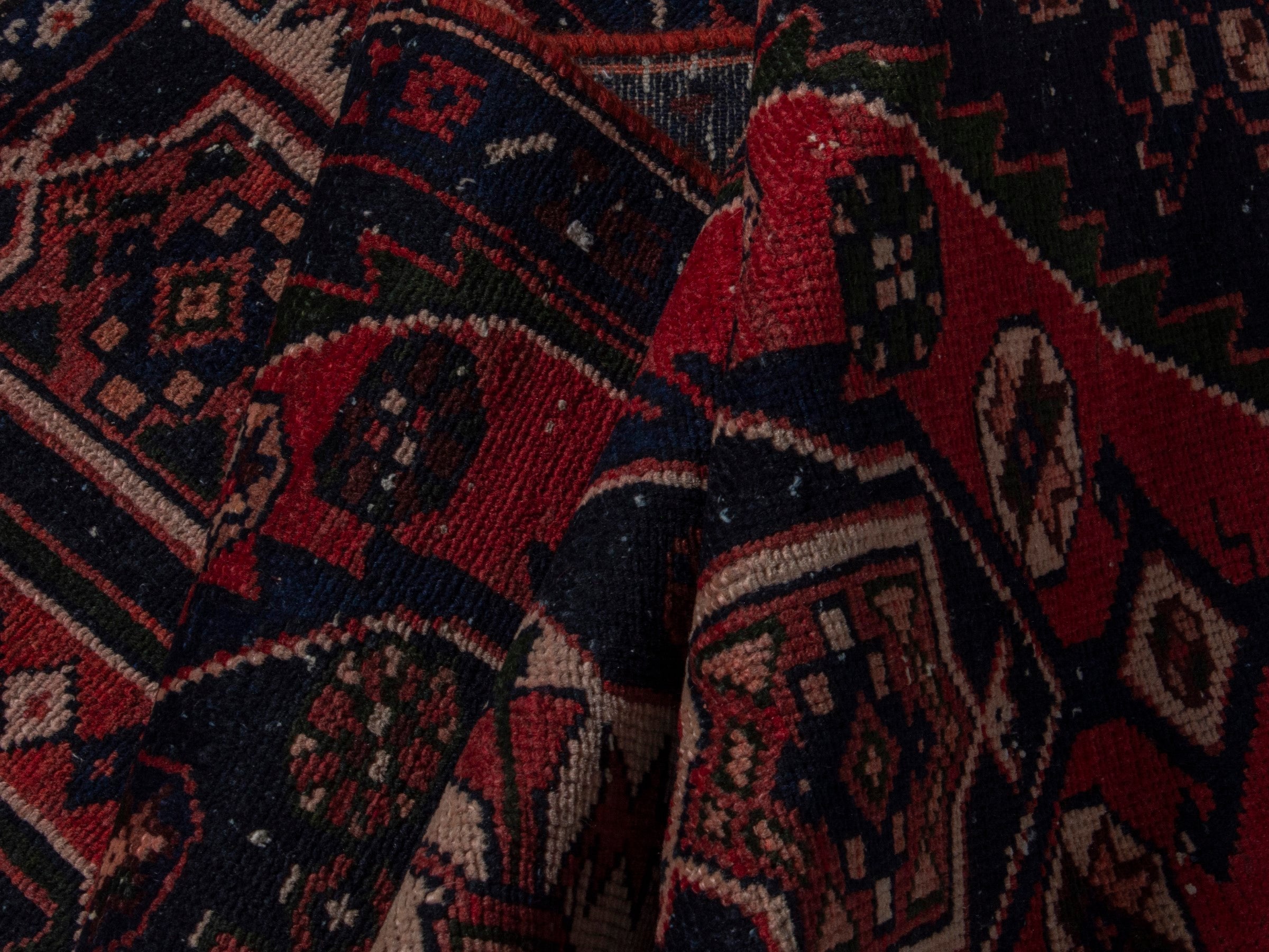 Persian Saveh accent rug in deep red and dark brown, view 18 of 20