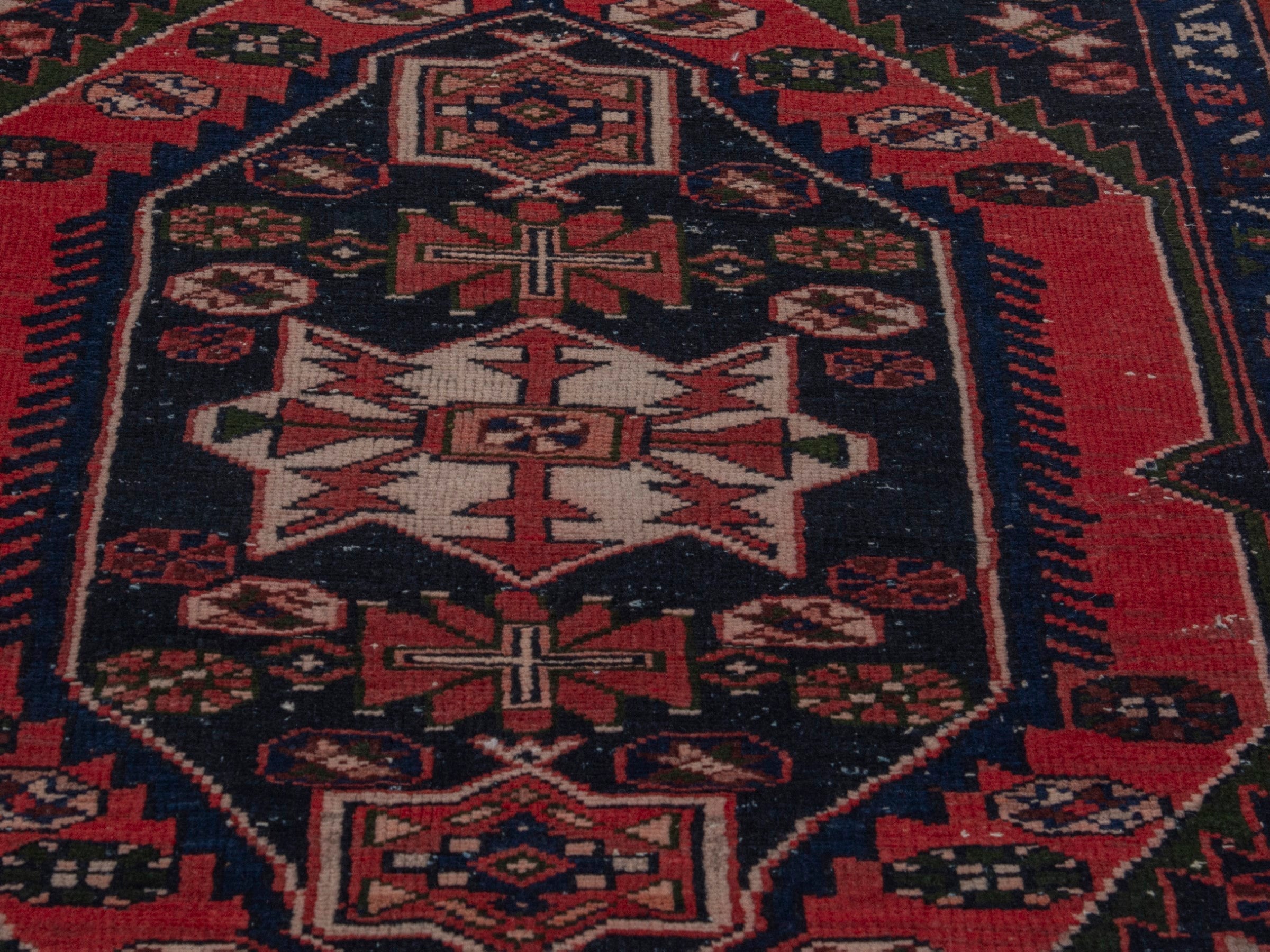 Persian Saveh accent rug in deep red and dark brown, view 9 of 20