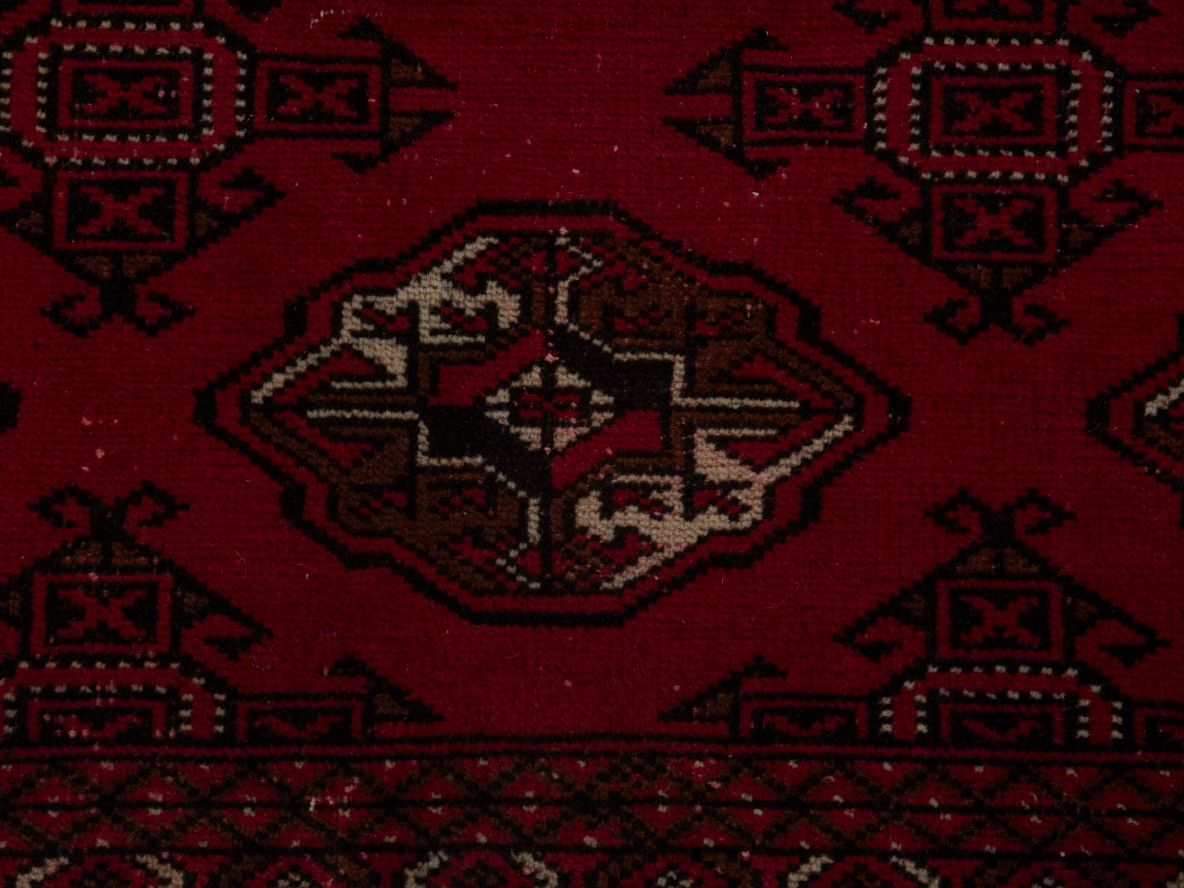 Persian Torkaman accent rug in burgundy and deep red, view 11 of 18
