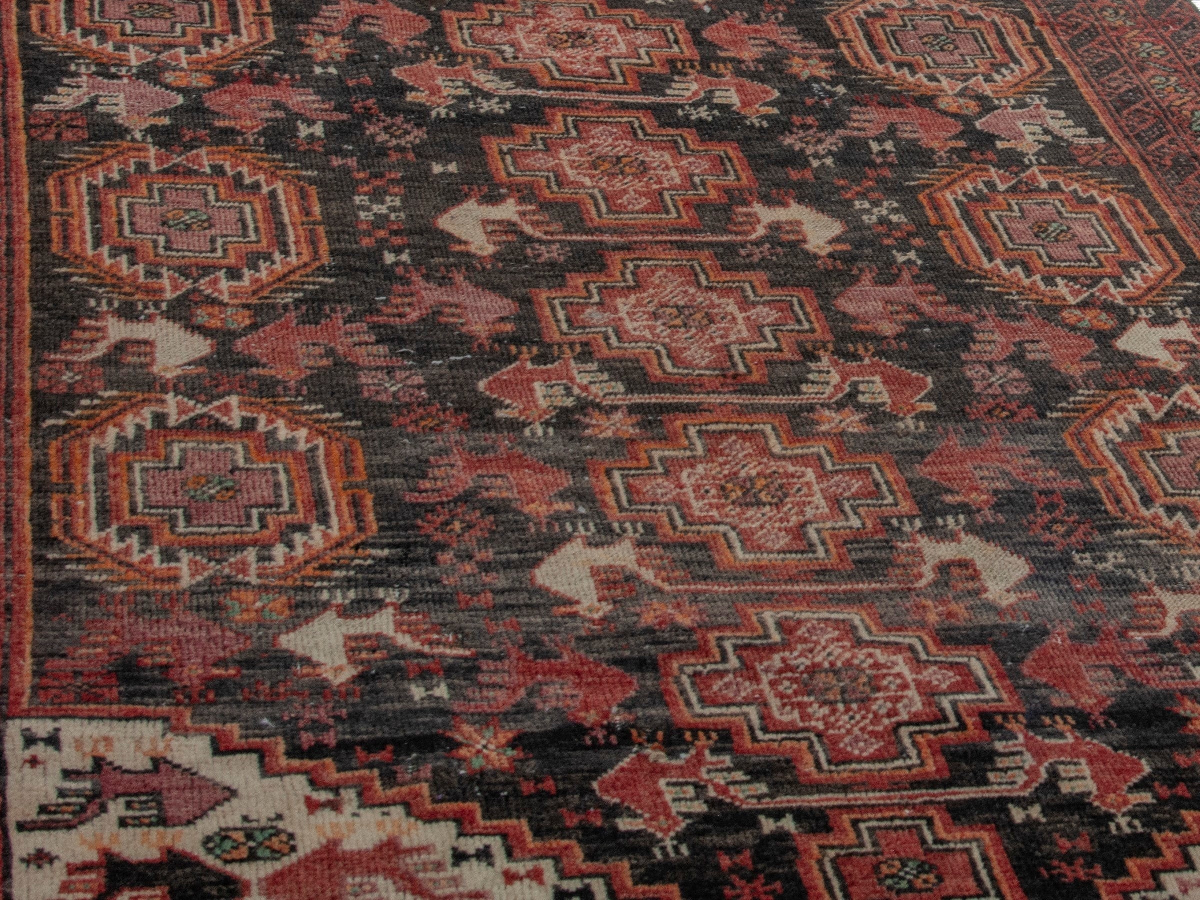 Persian Baluch accent rug in dark blue and burgundy, view 9 of 16