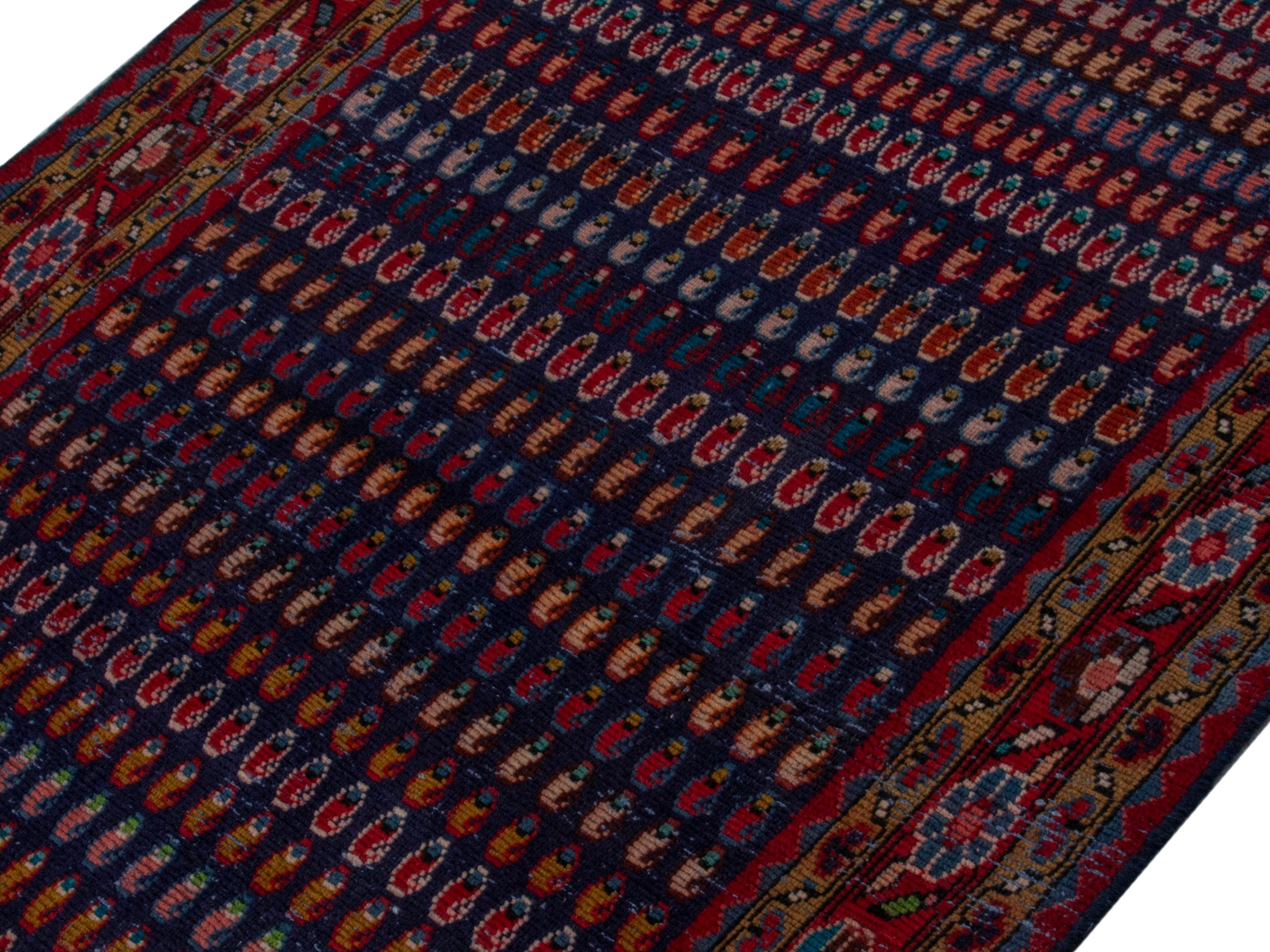 Persian Vist accent rug in navy and burgundy, view 3 of 16