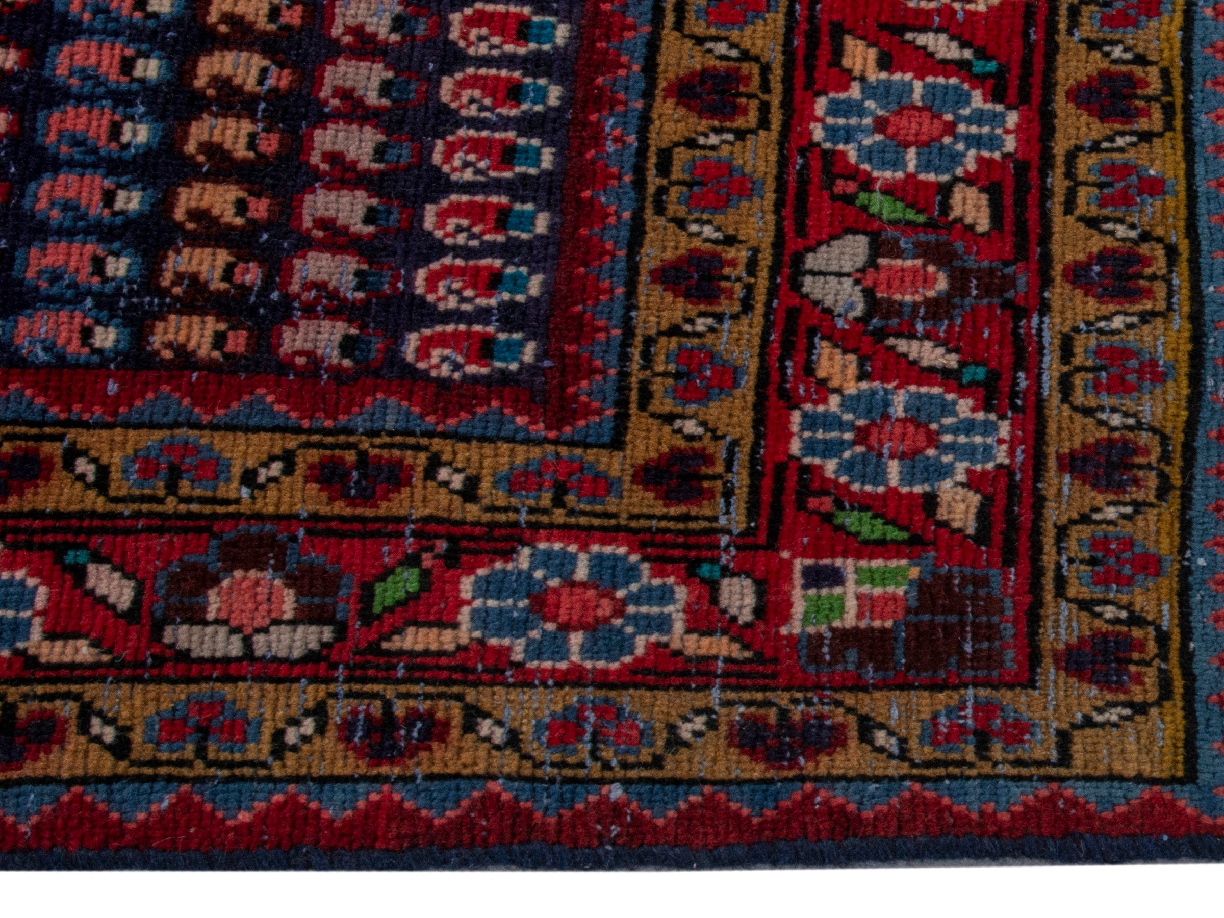 Persian Vist accent rug in navy and burgundy, view 4 of 16