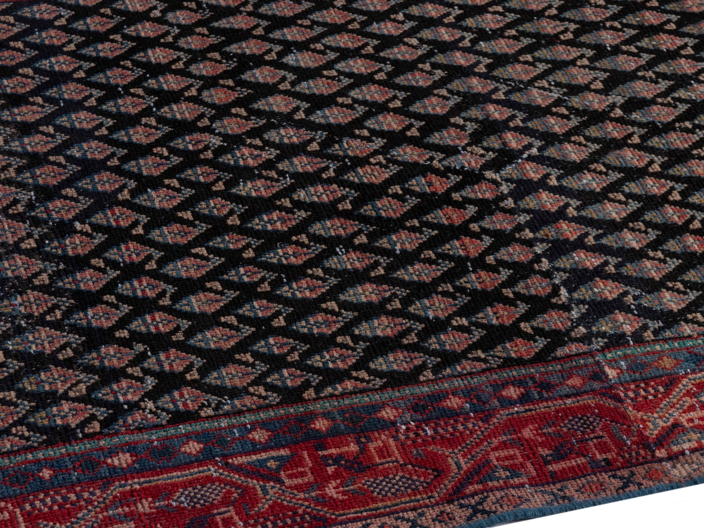 Persian Botteh accent rug in charcoal and faded red, view 7 of 16