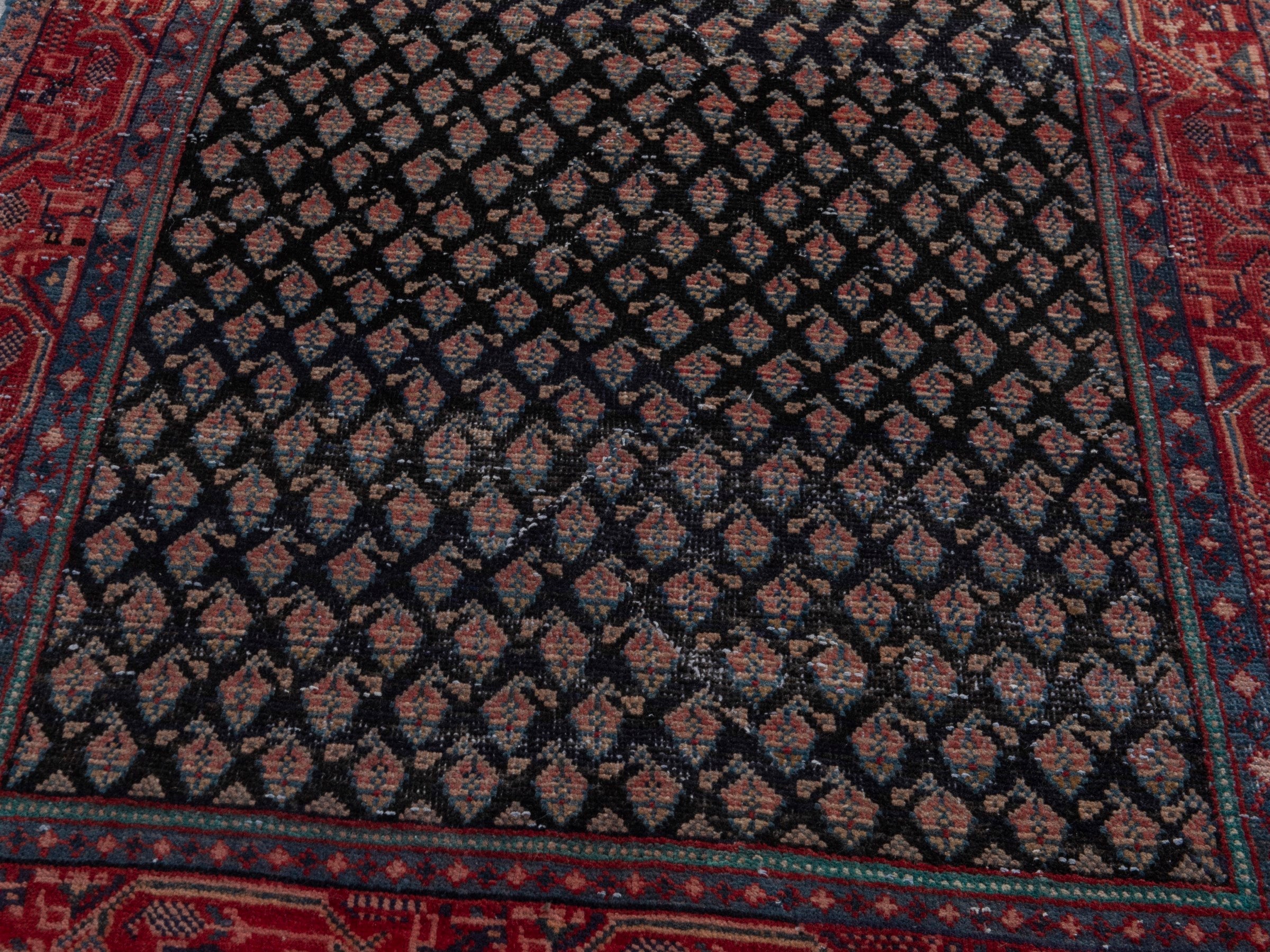 Persian Botteh accent rug in charcoal and faded red, view 8 of 16