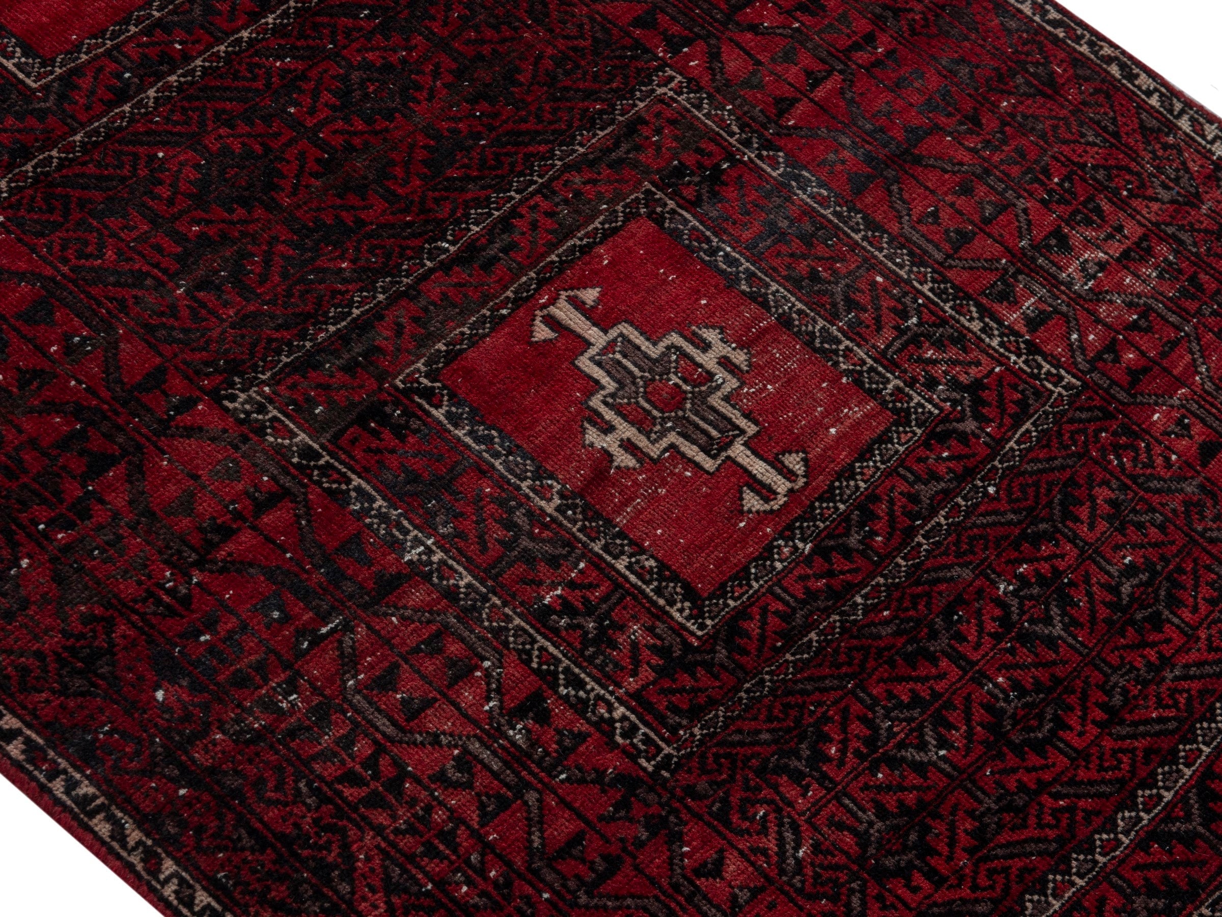 Persian Baluch accent rug in burgundy and deep red, view 3 of 16