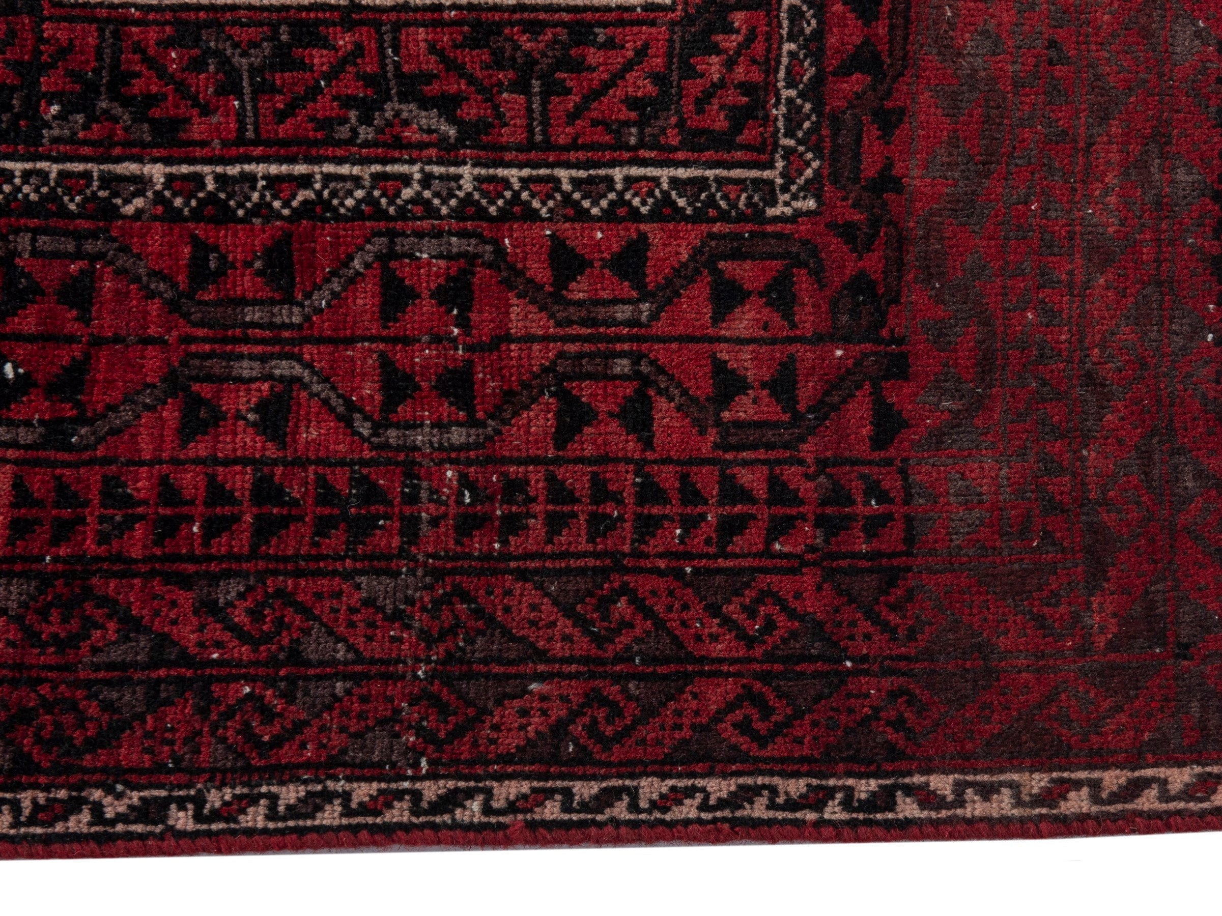 Persian Baluch accent rug in burgundy and deep red, view 4 of 16
