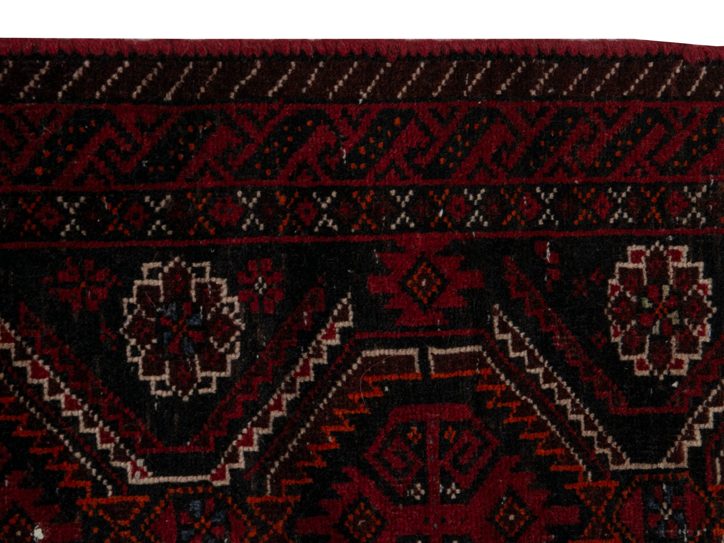 Persian Baluch accent rug in burgundy and deep red, view 9 of 16