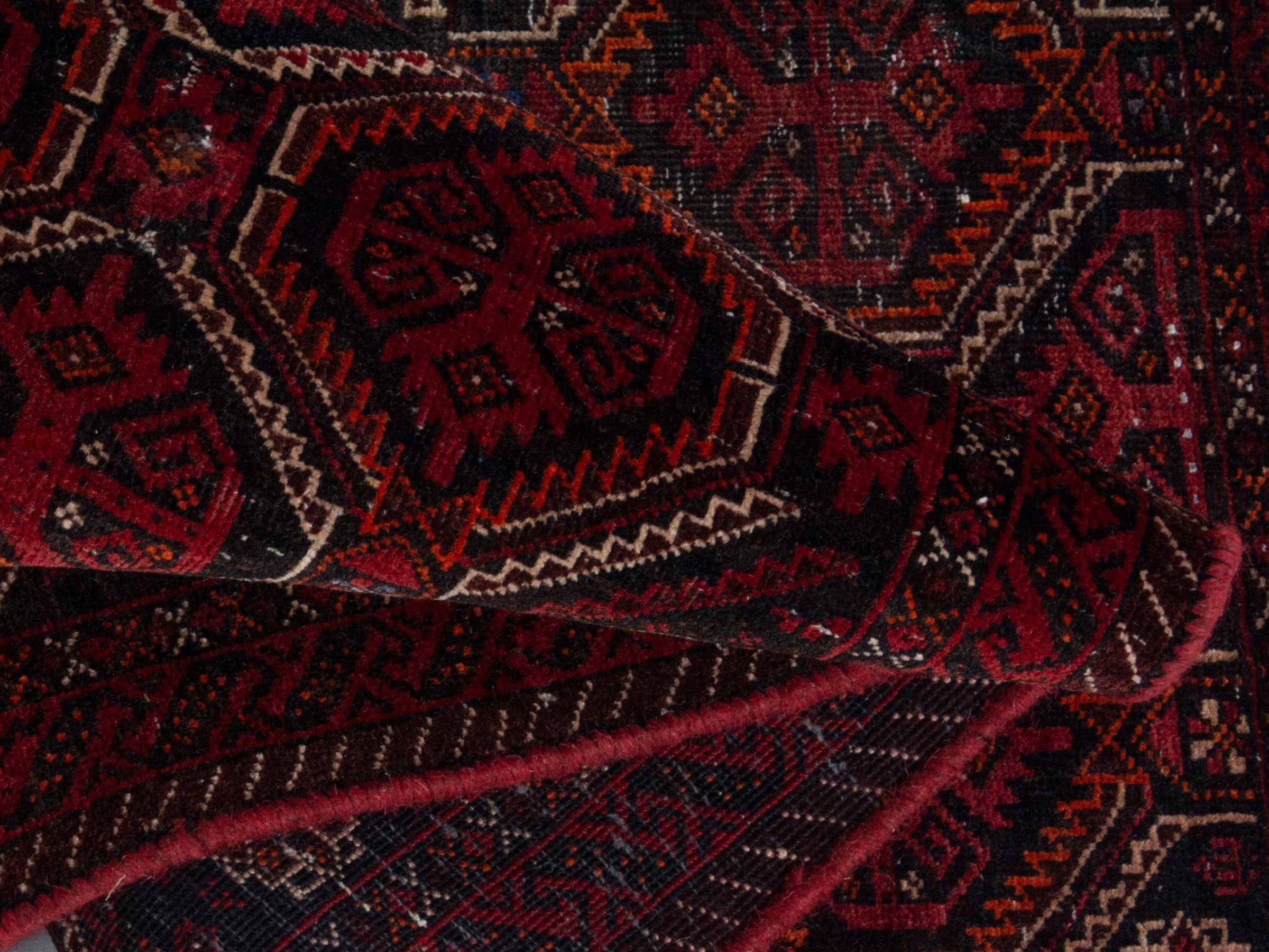 Persian Baluch accent rug in burgundy and deep red, view 13 of 16