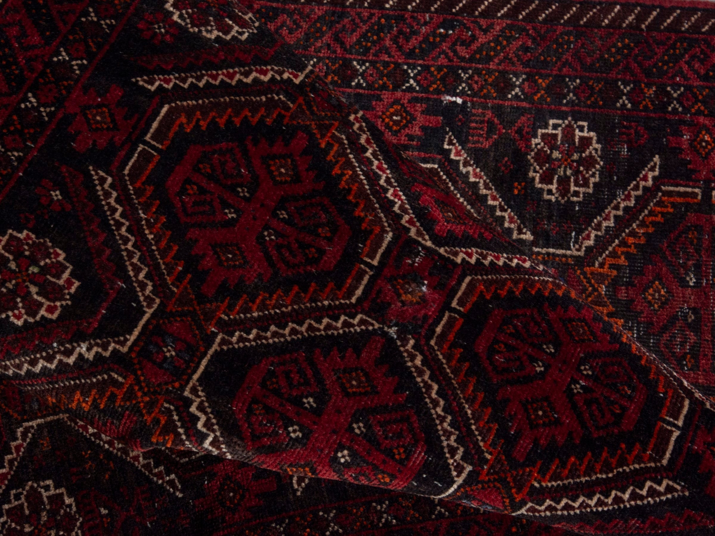 Persian Baluch accent rug in burgundy and deep red, view 14 of 16
