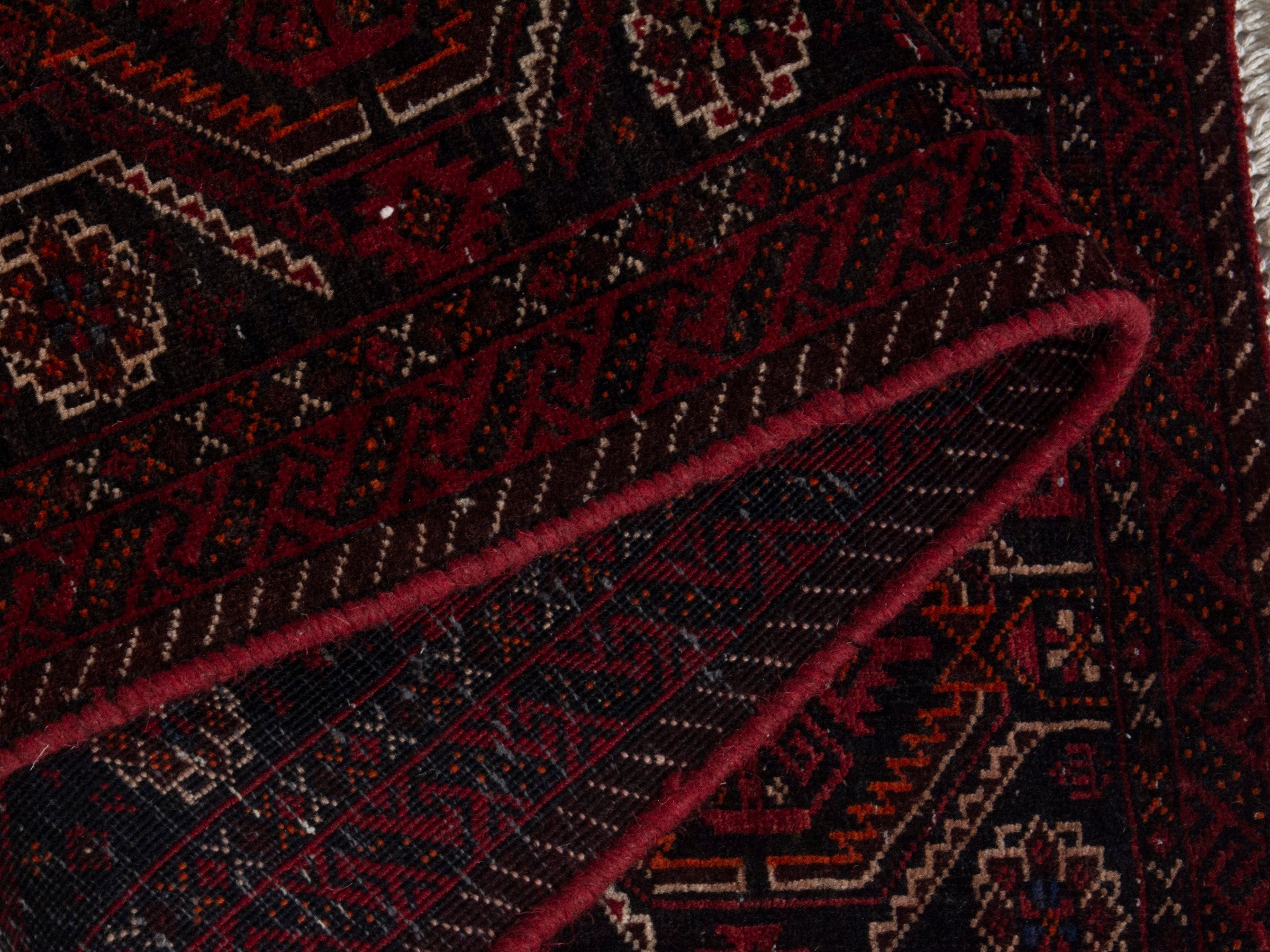 Persian Baluch accent rug in burgundy and deep red, view 15 of 16
