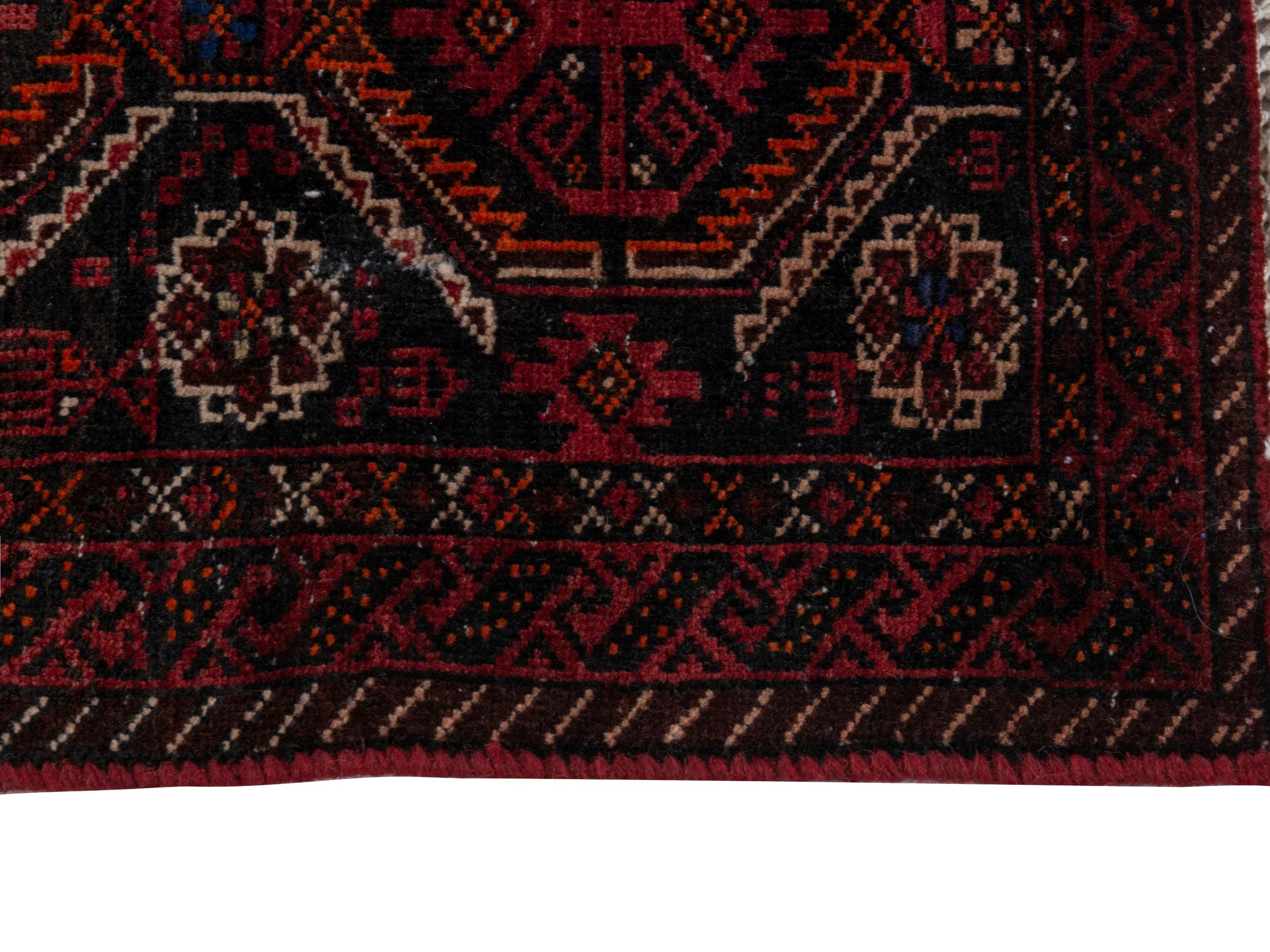 Persian Baluch accent rug in burgundy and deep red, view 3 of 16