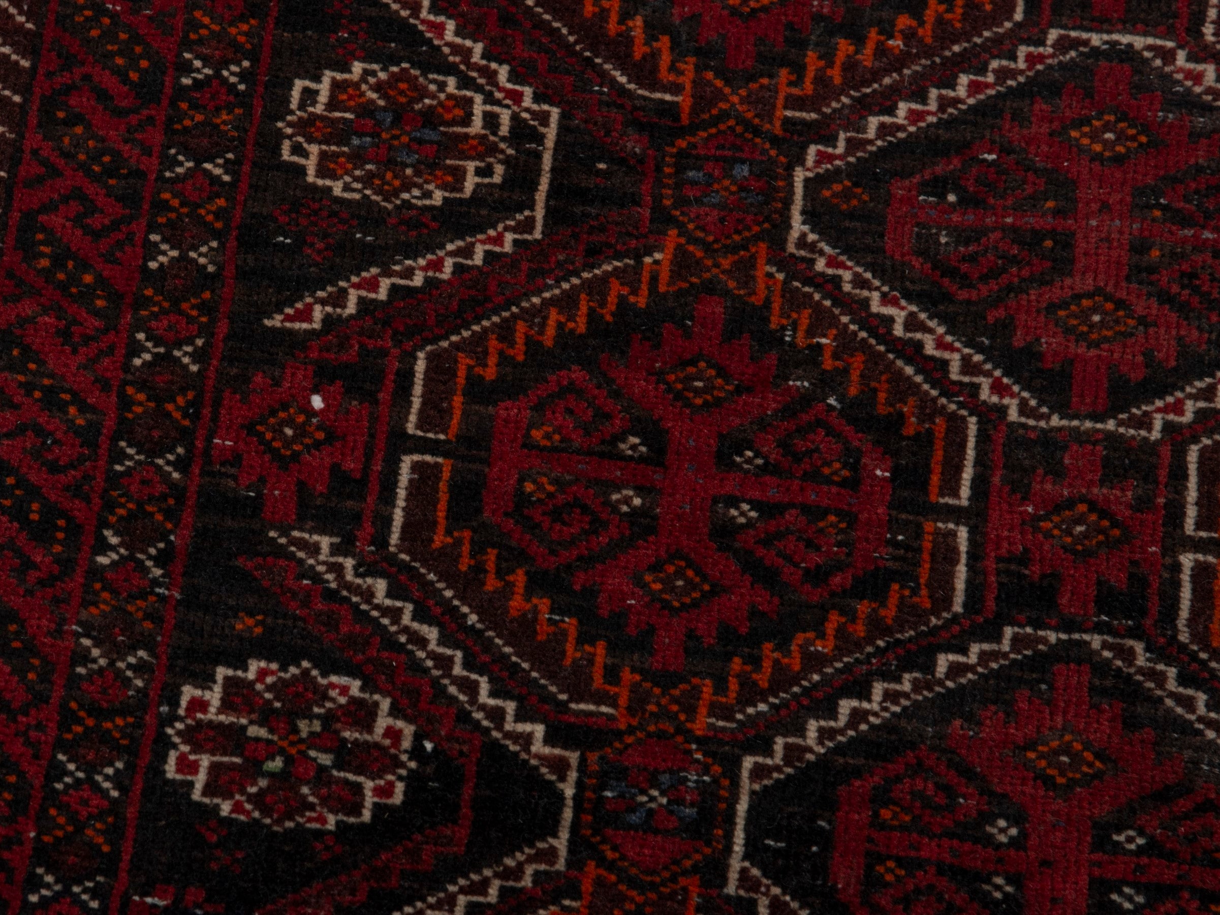 Persian Baluch accent rug in burgundy and deep red, view 5 of 16