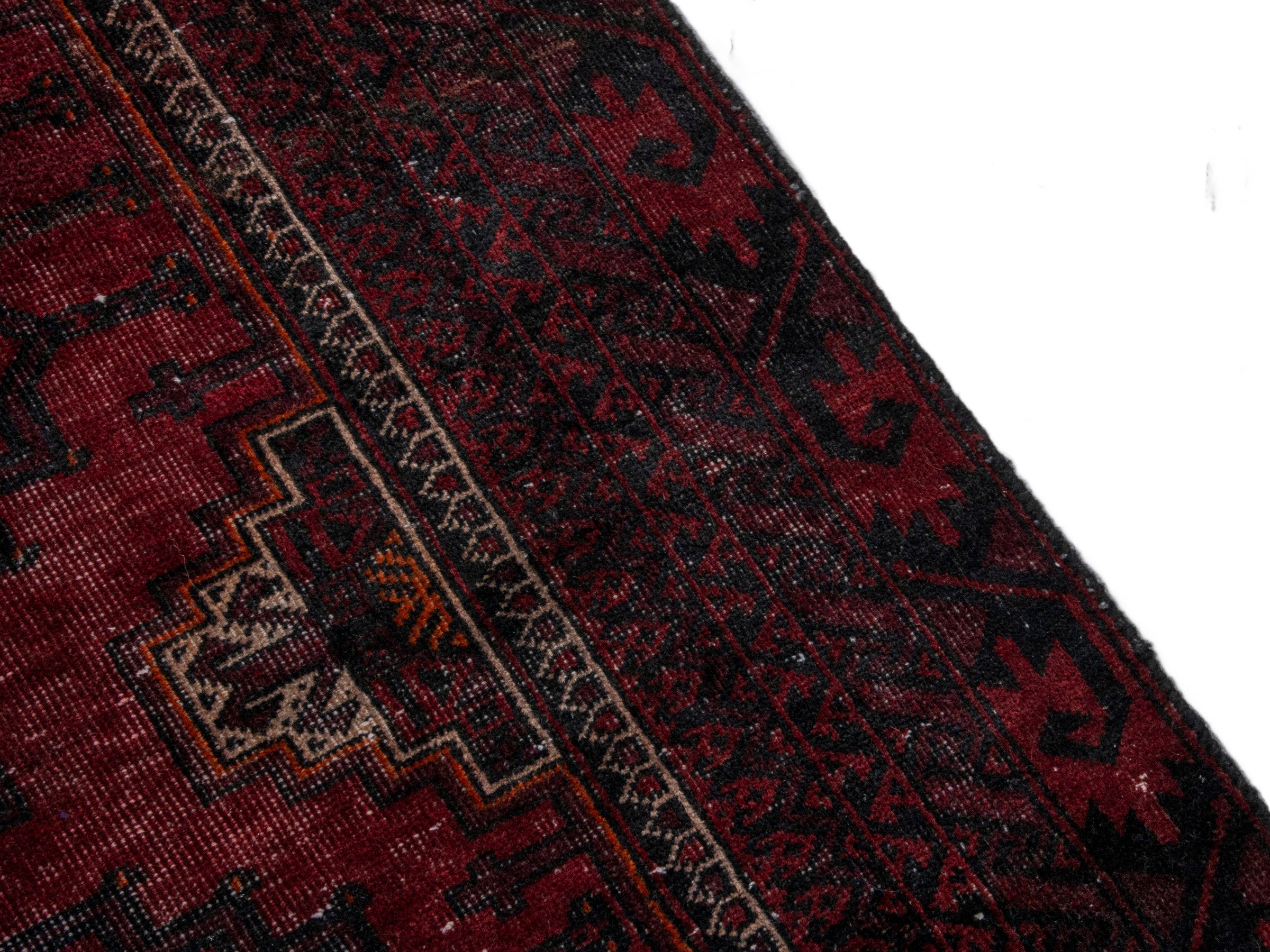 Persian Baluch runner rug in burgundy and deep red, view 6 of 16