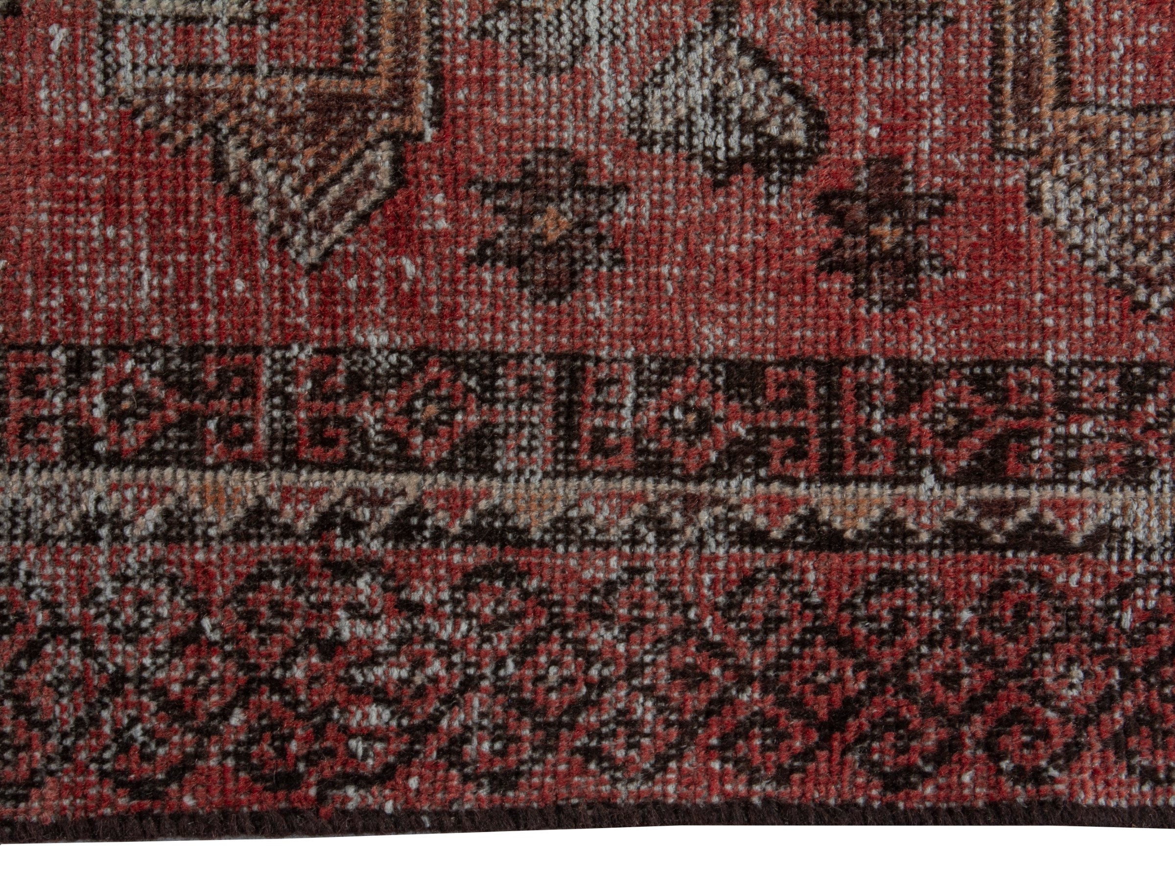 Persian Baluch accent rug in faded red and burgundy, view 12 of 16