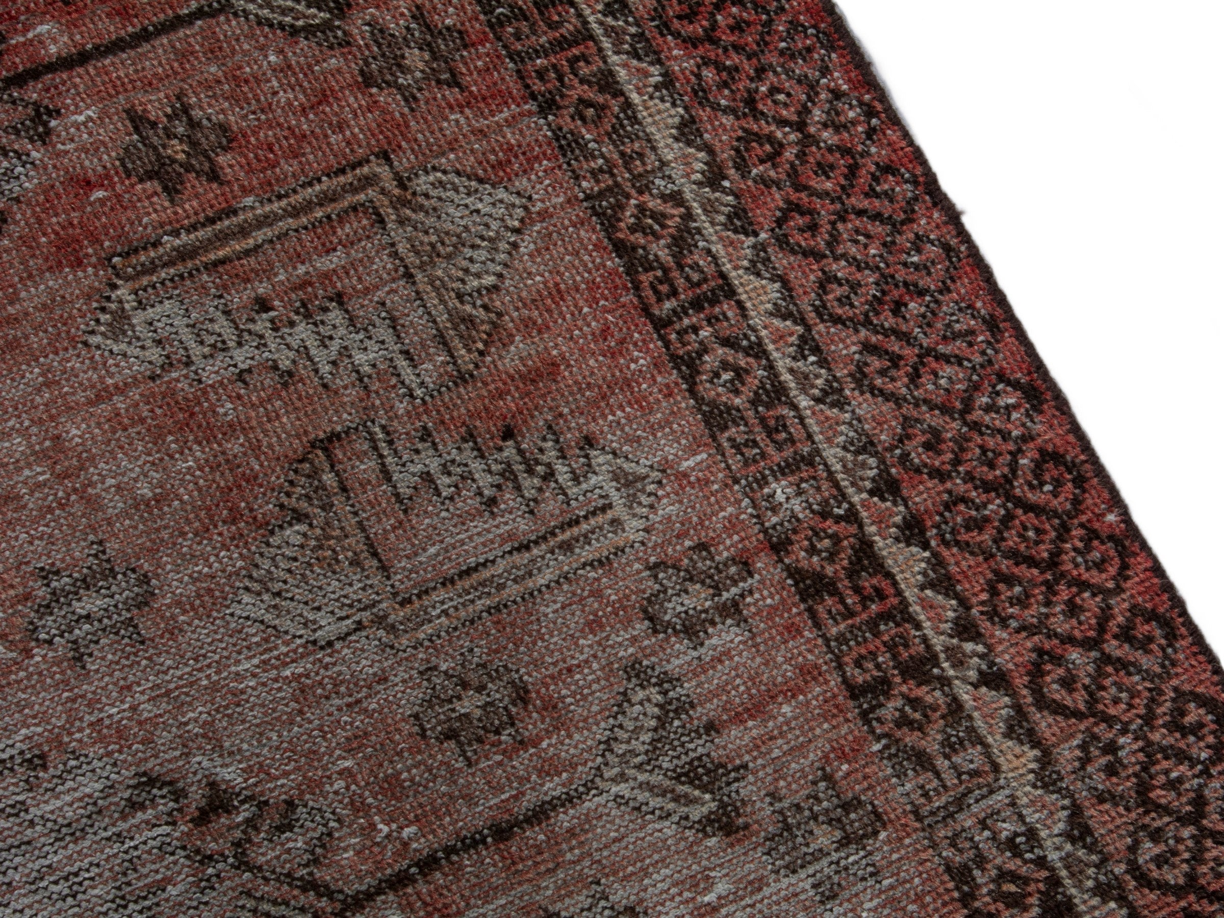 Persian Baluch accent rug in faded red and burgundy, view 6 of 16