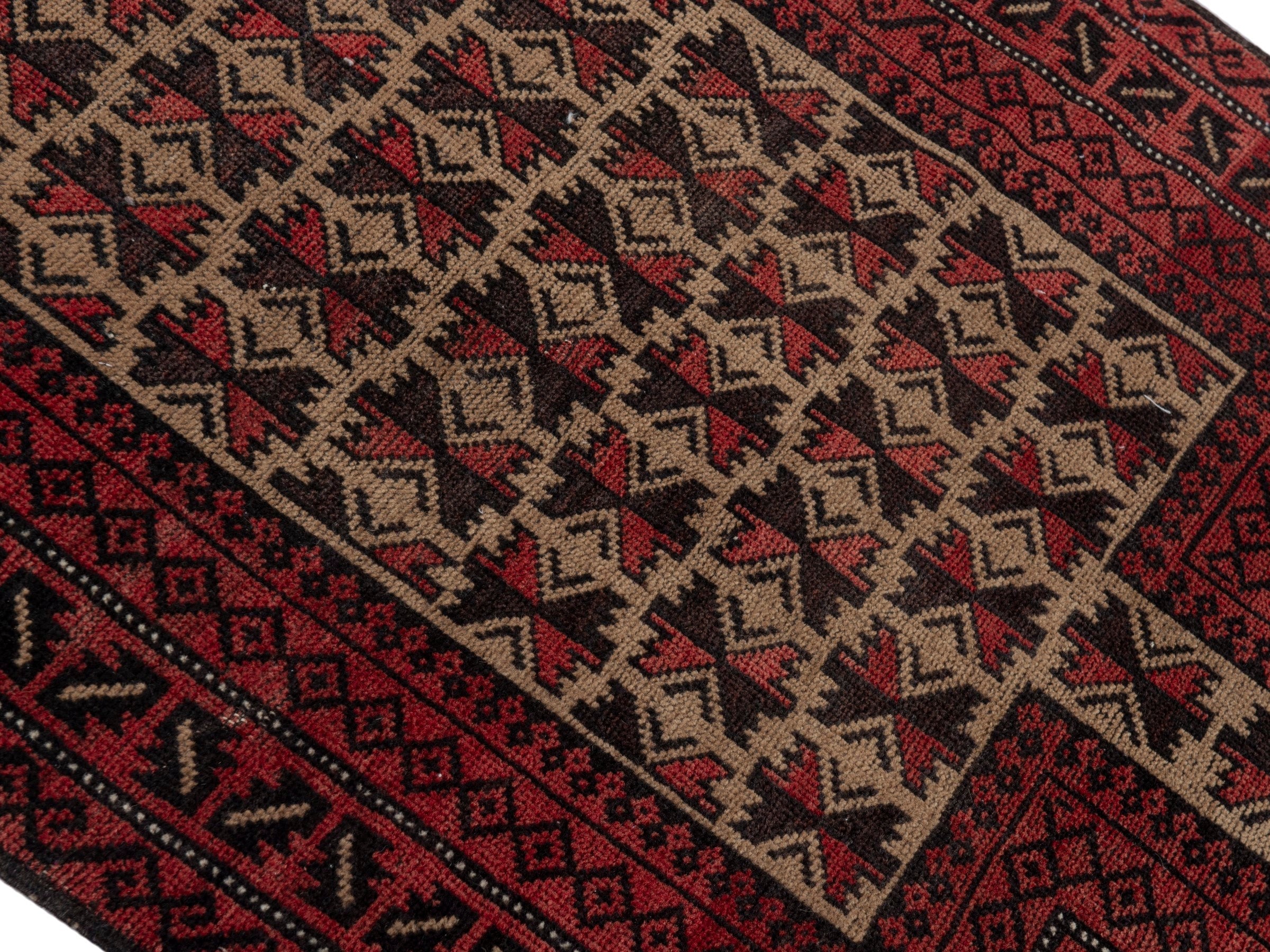 Persian Baluch accent rug in burgundy and cream, view 3 of 16