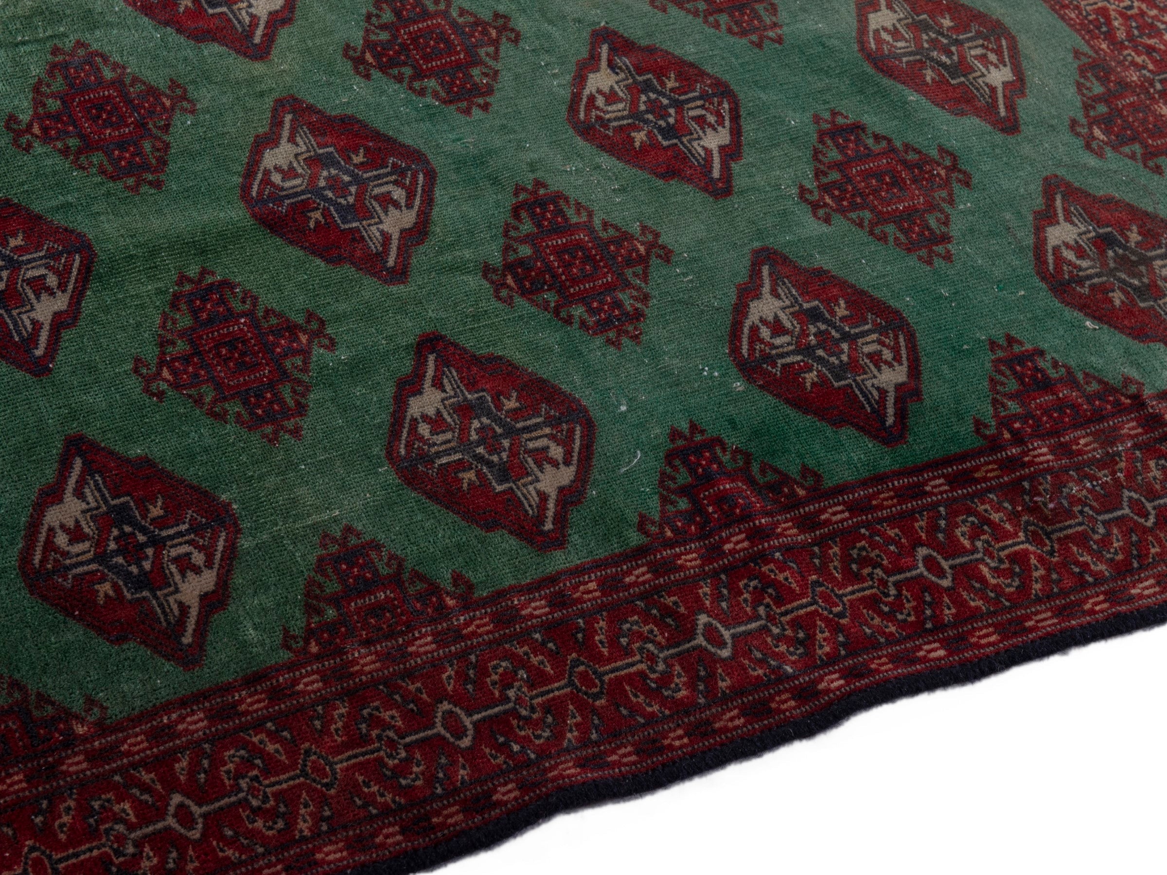 Persian Torkaman accent rug in burgundy and teal, view 7 of 17