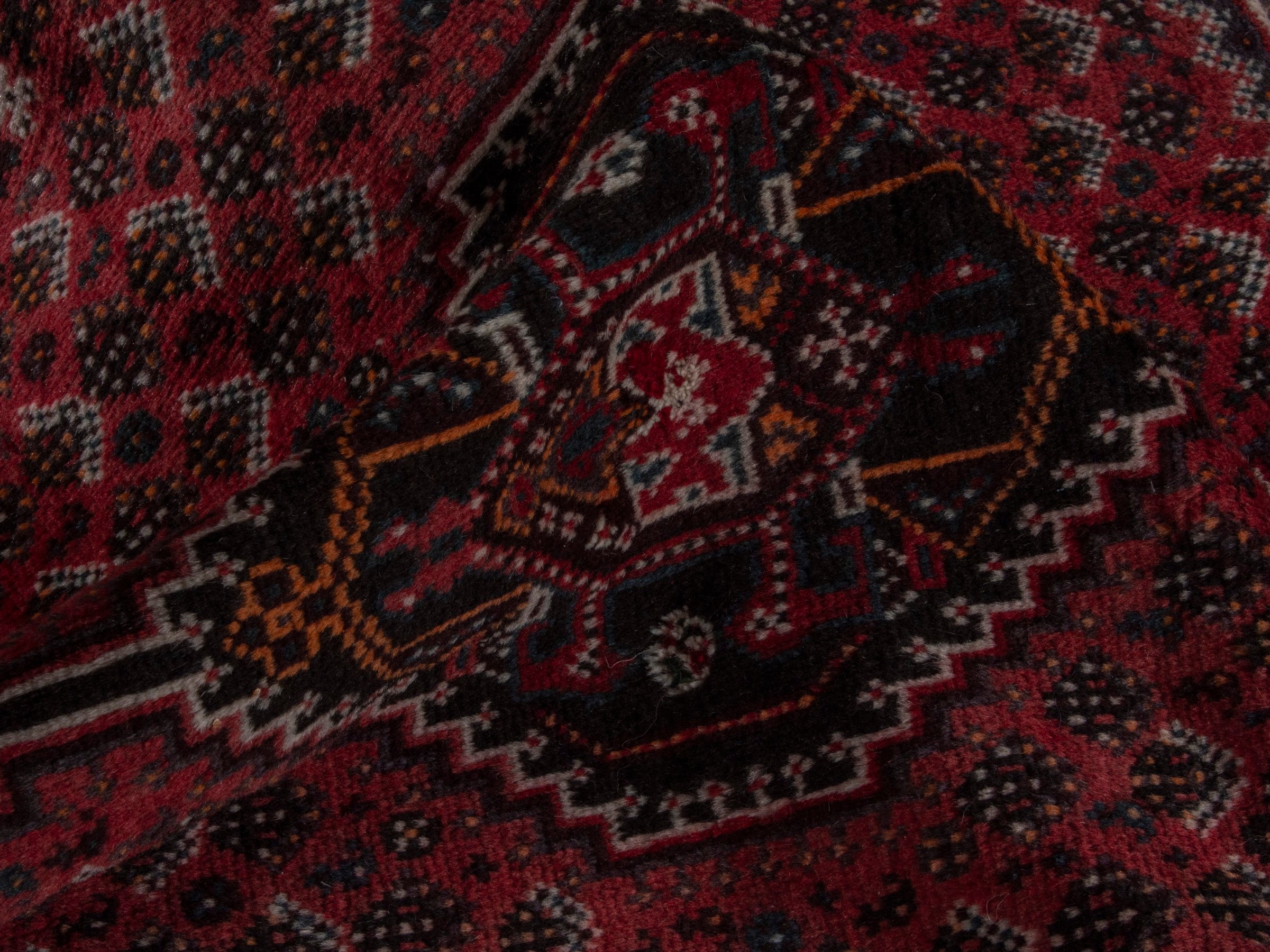 Persian Shiraz accent rug in burgundy and deep red, view 14 of 16