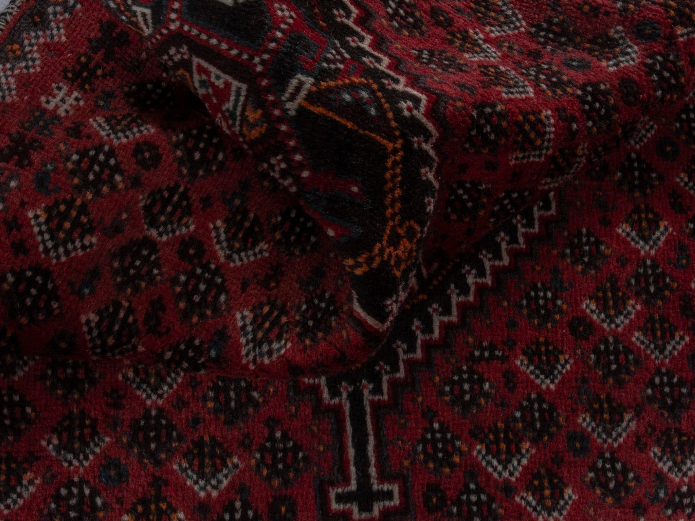 Persian Shiraz accent rug in burgundy and deep red, view 15 of 16