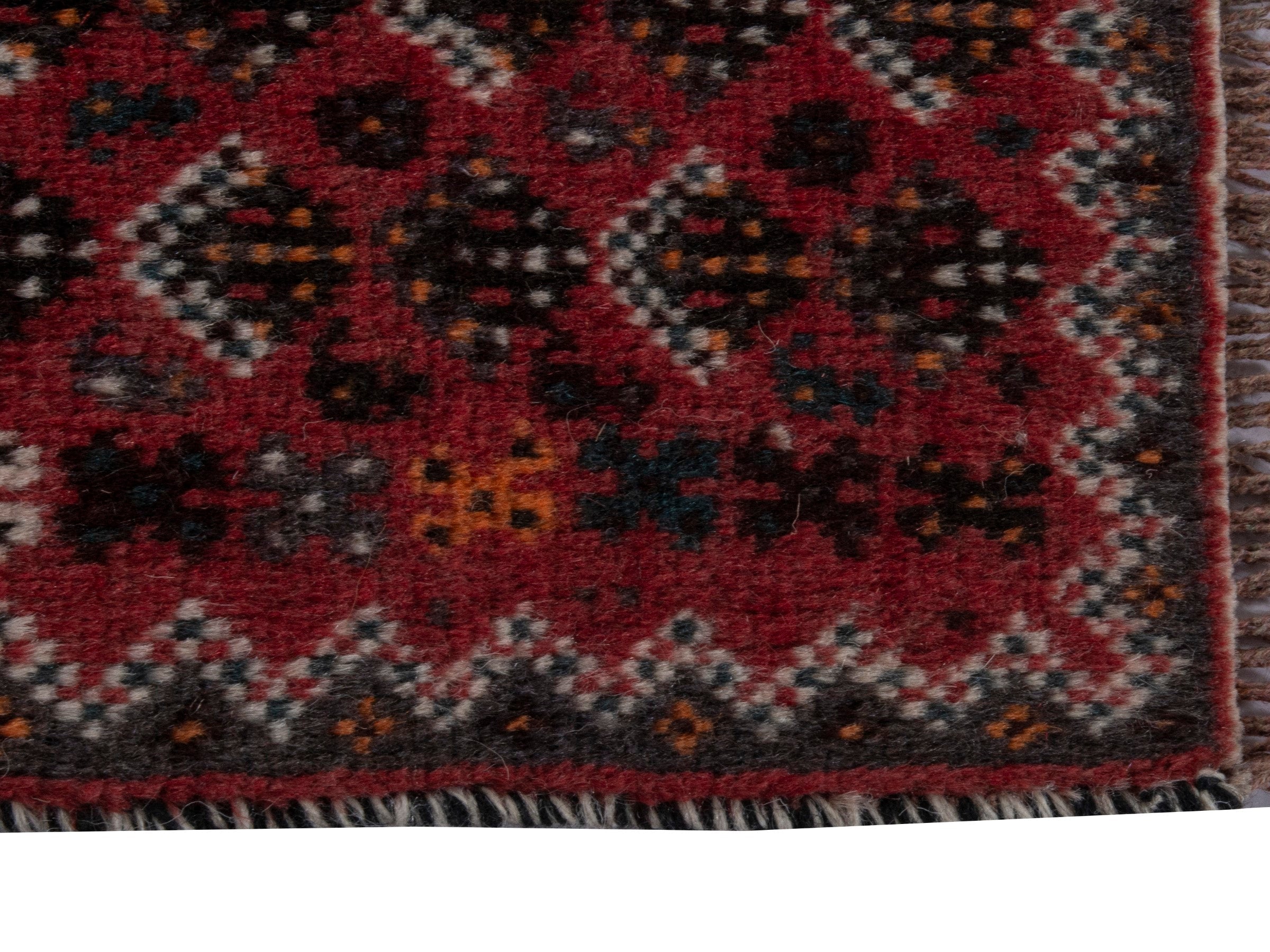 Persian Shiraz accent rug in burgundy and deep red, view 4 of 16