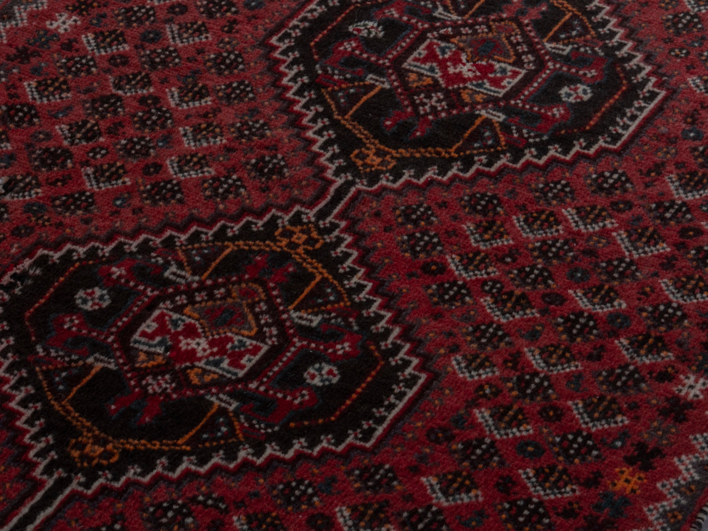 Persian Shiraz accent rug in burgundy and deep red, view 8 of 16