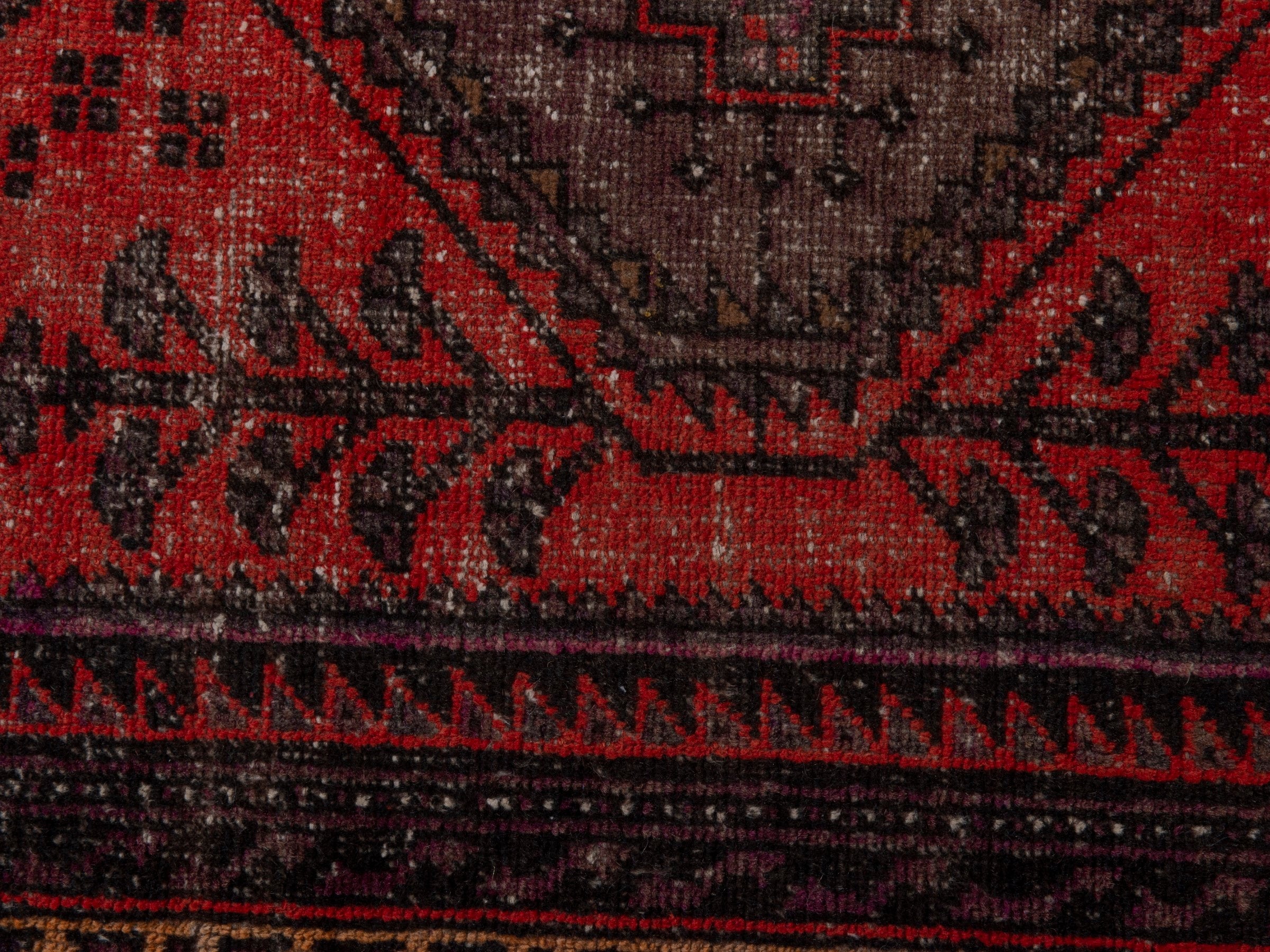 Persian Zanjan accent rug in deep red and charcoal, view 11 of 16