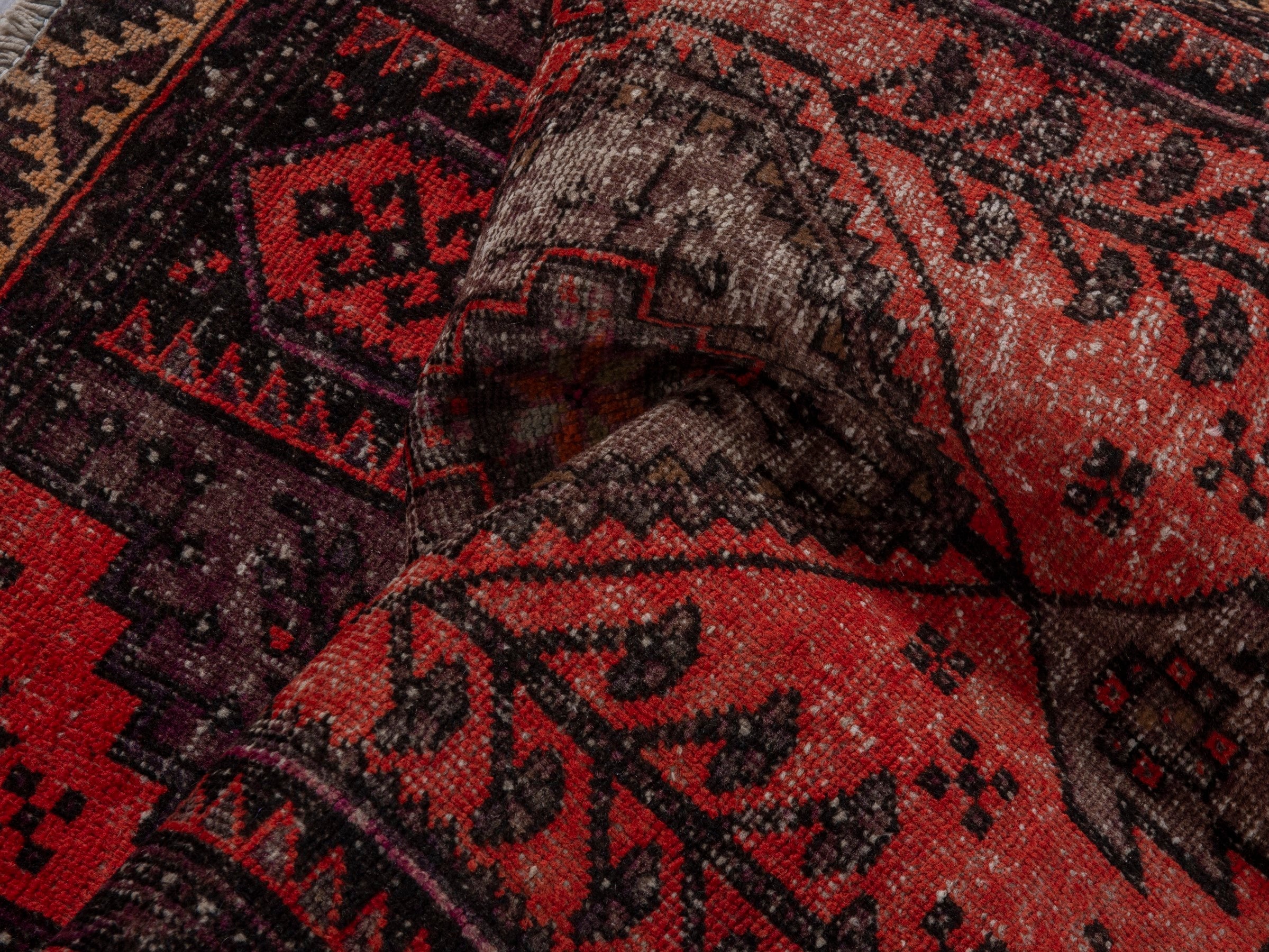 Persian Zanjan accent rug in deep red and charcoal, view 12 of 16
